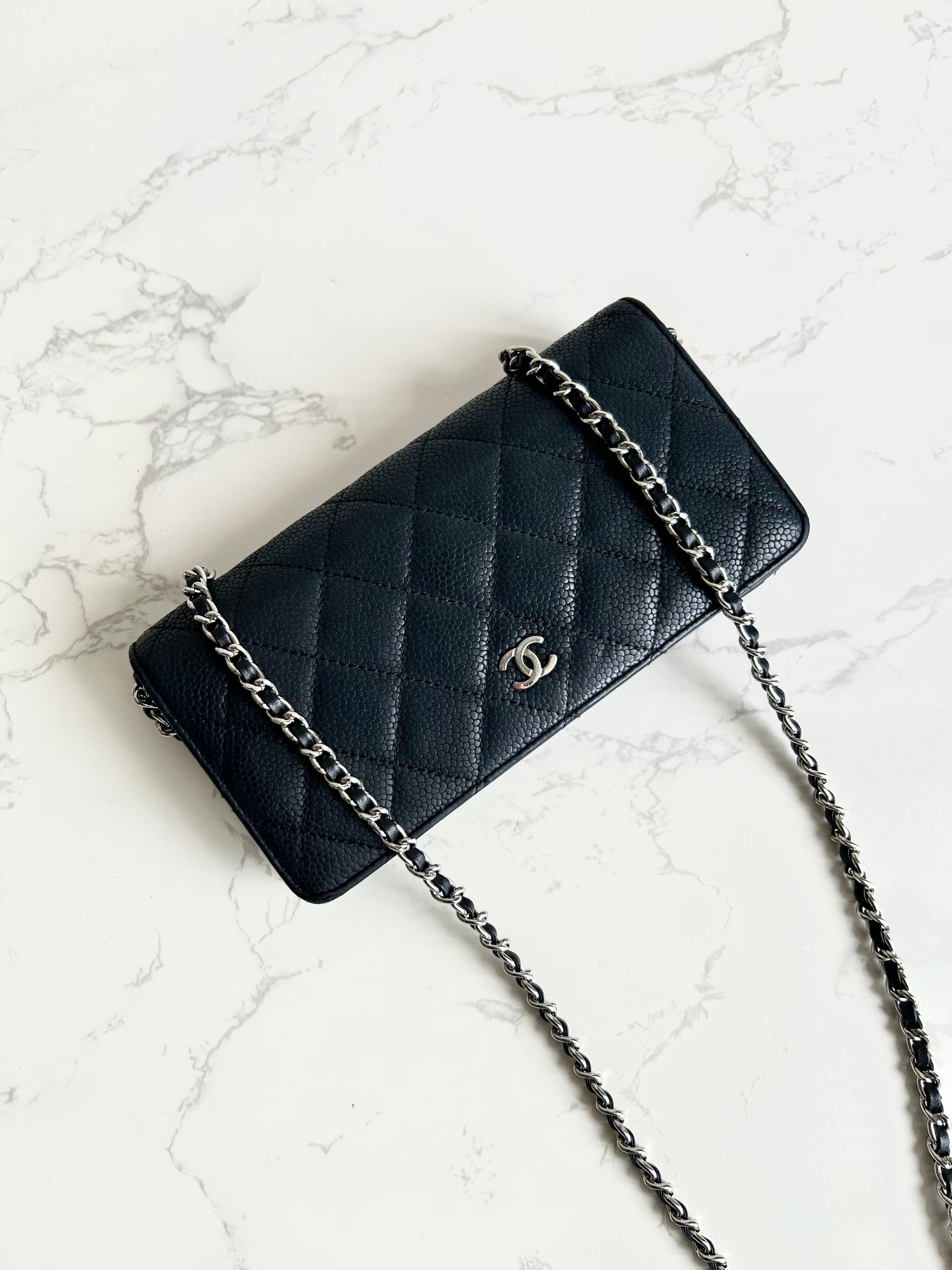 CHANEL black silver buckle caviar leather WOC long wallet / oblique bag / side bag