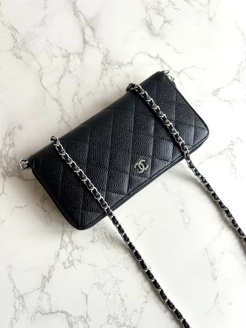 Chanel black WOC leather side bag/oblique bag/long clip