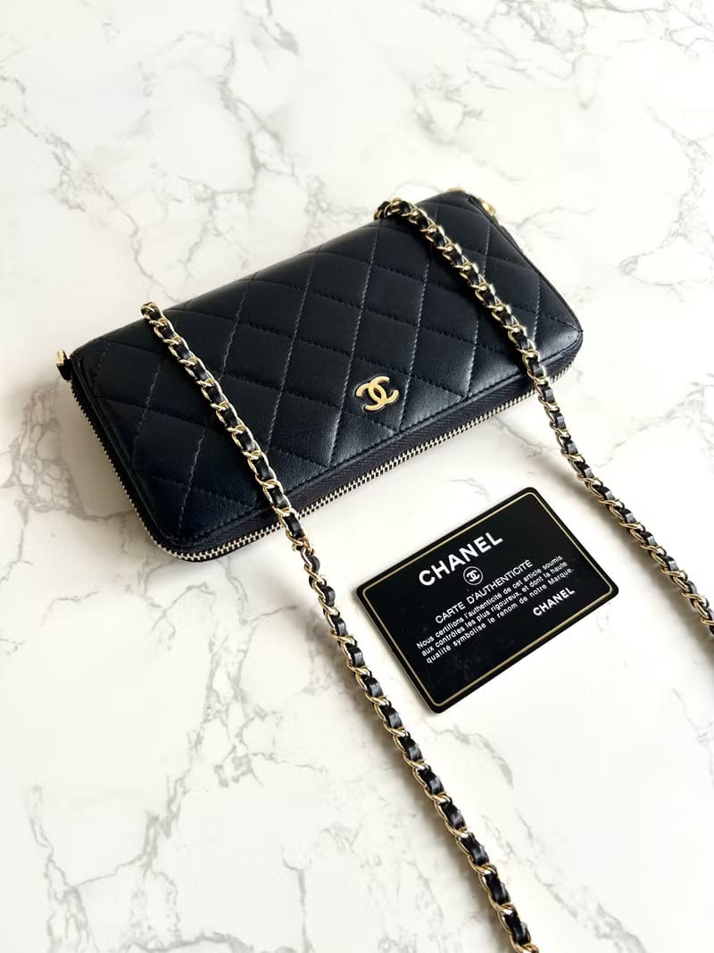 Chanel black WOC leather side bag/oblique bag/long clip