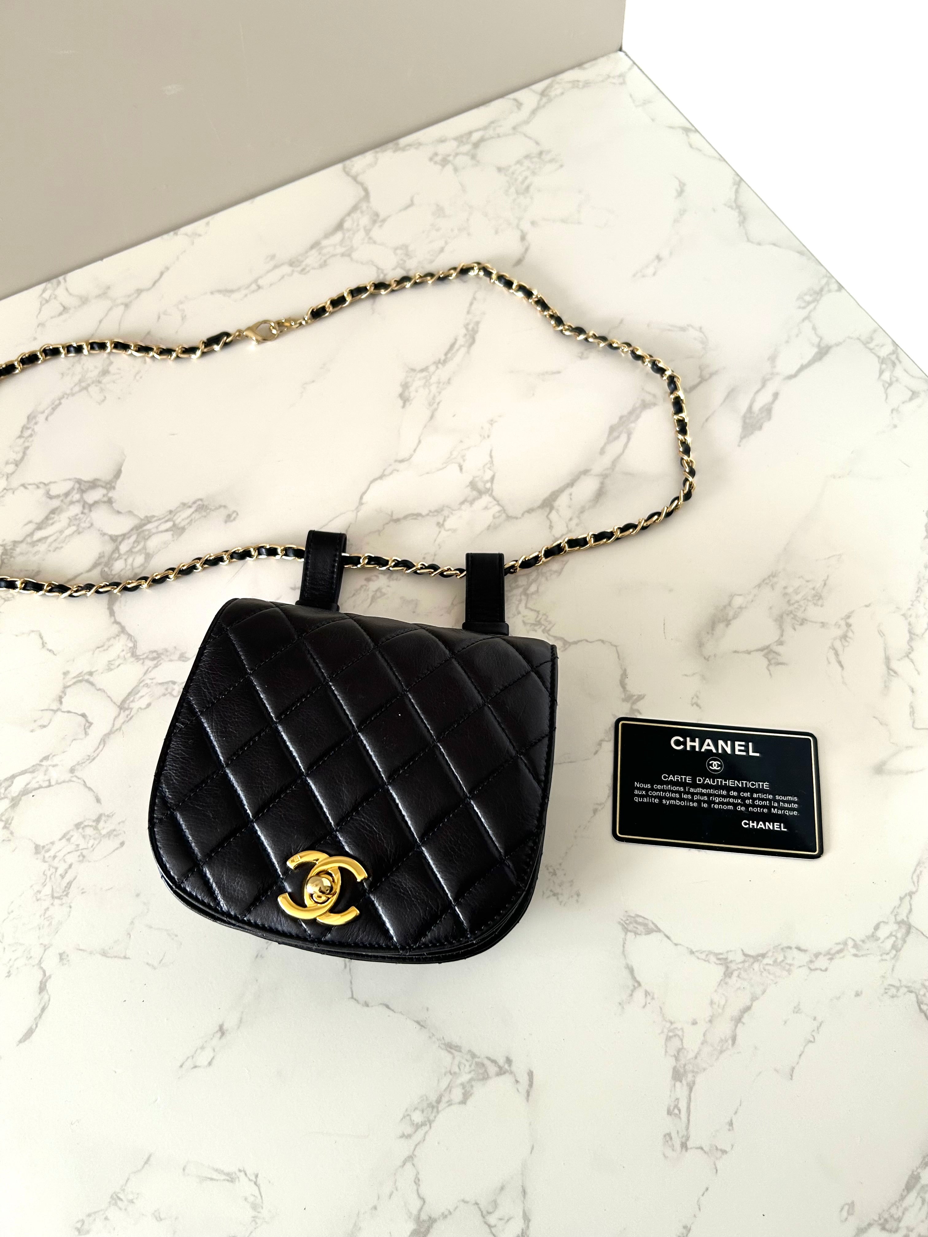 CHANEL rare black lambskin leather swivel buckle saddle bag / clutch / oblique bag
