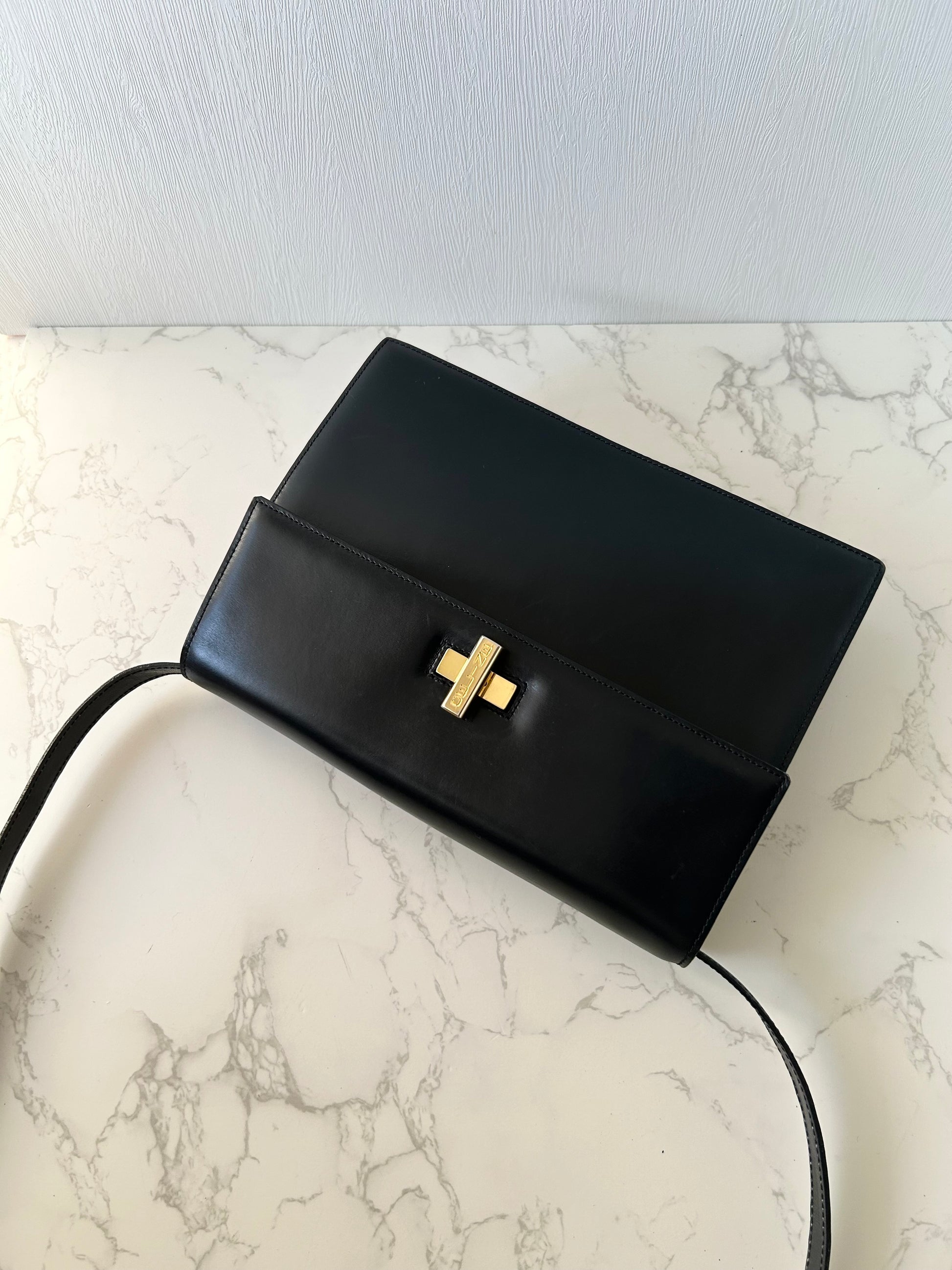 CELINE rare black cross rotating gold buckle leather small shoulder bag / crossbody bag