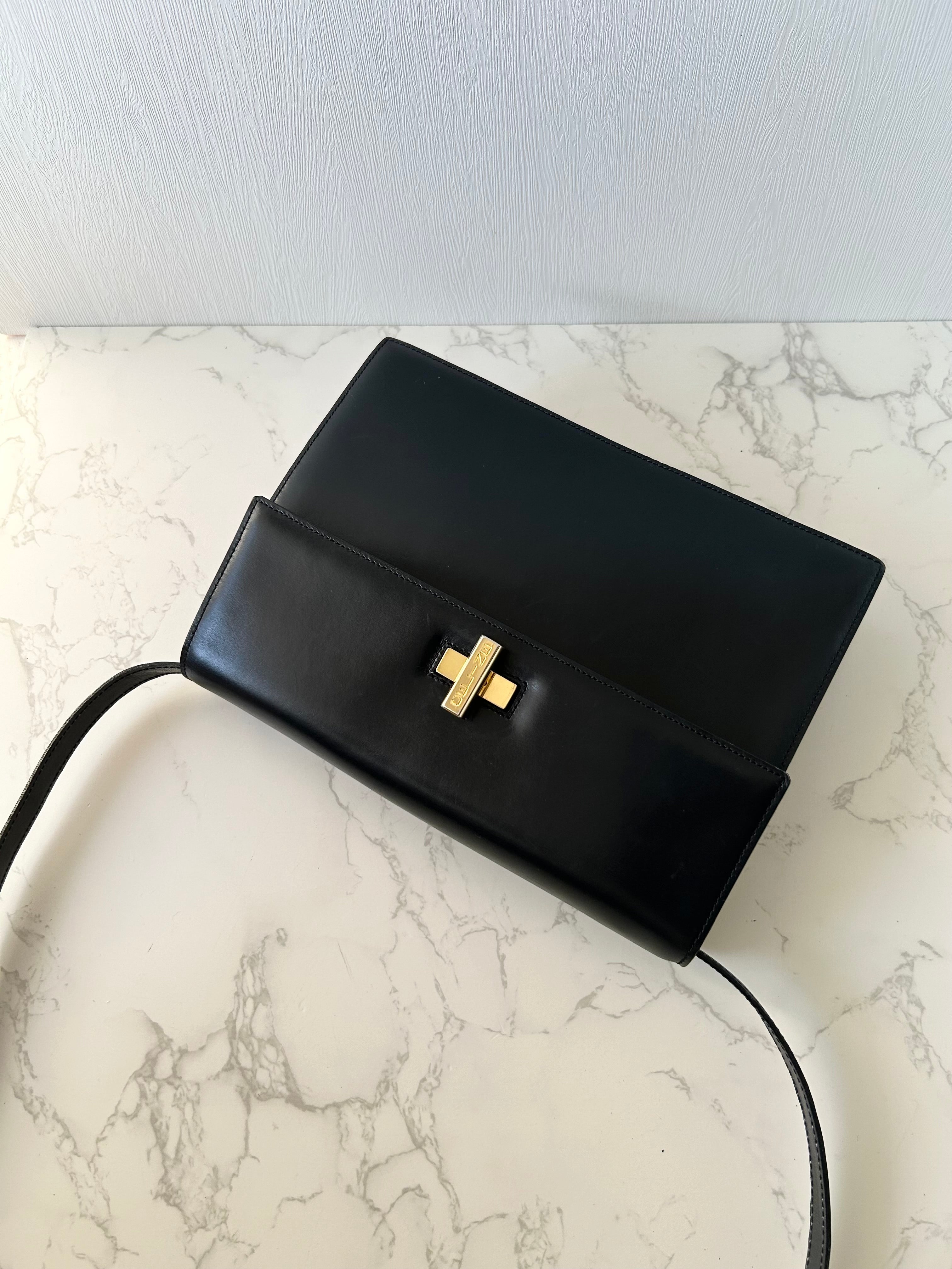 CELINE rare black cross rotating gold buckle leather small shoulder bag / crossbody bag