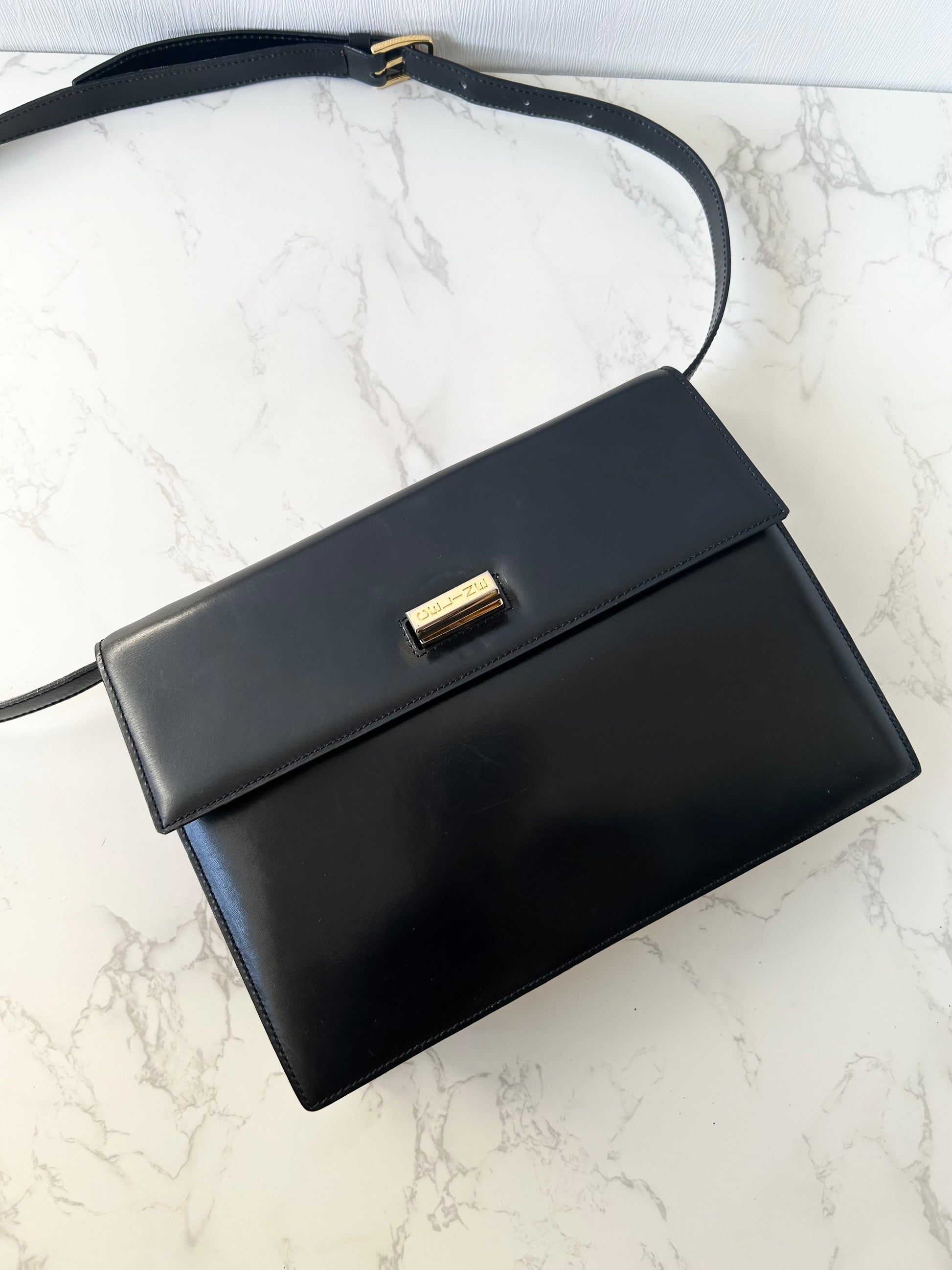 CELINE rare black cross rotating gold buckle leather small shoulder bag / crossbody bag