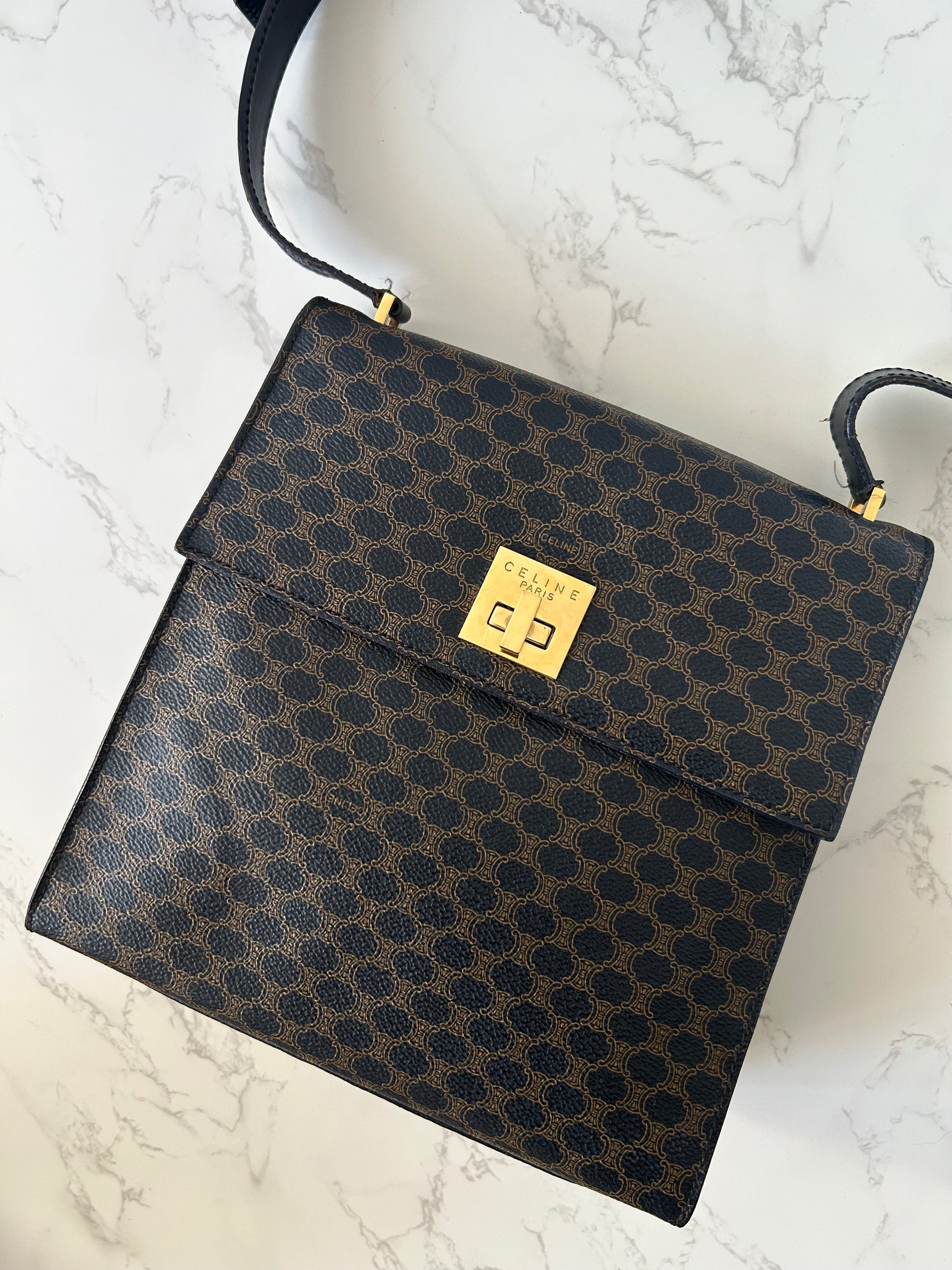 CELINE rare black old flower gold rotating buckle leather Kelly side bag / oblique bag