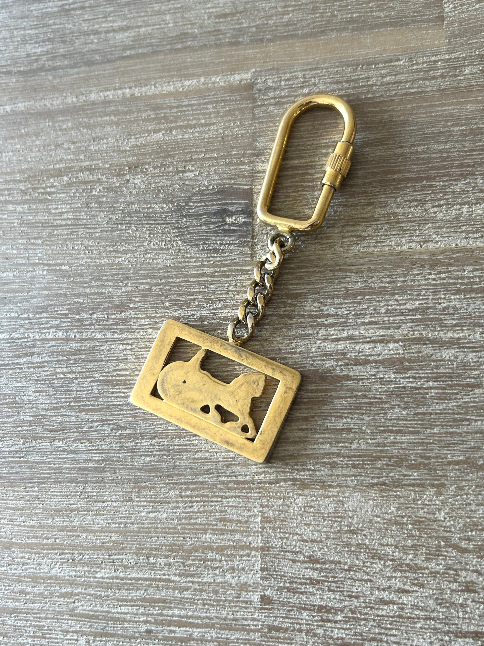 女神節滿額 HKD$3888贈品 - CELINE 經典金色馬車鎖匙扣