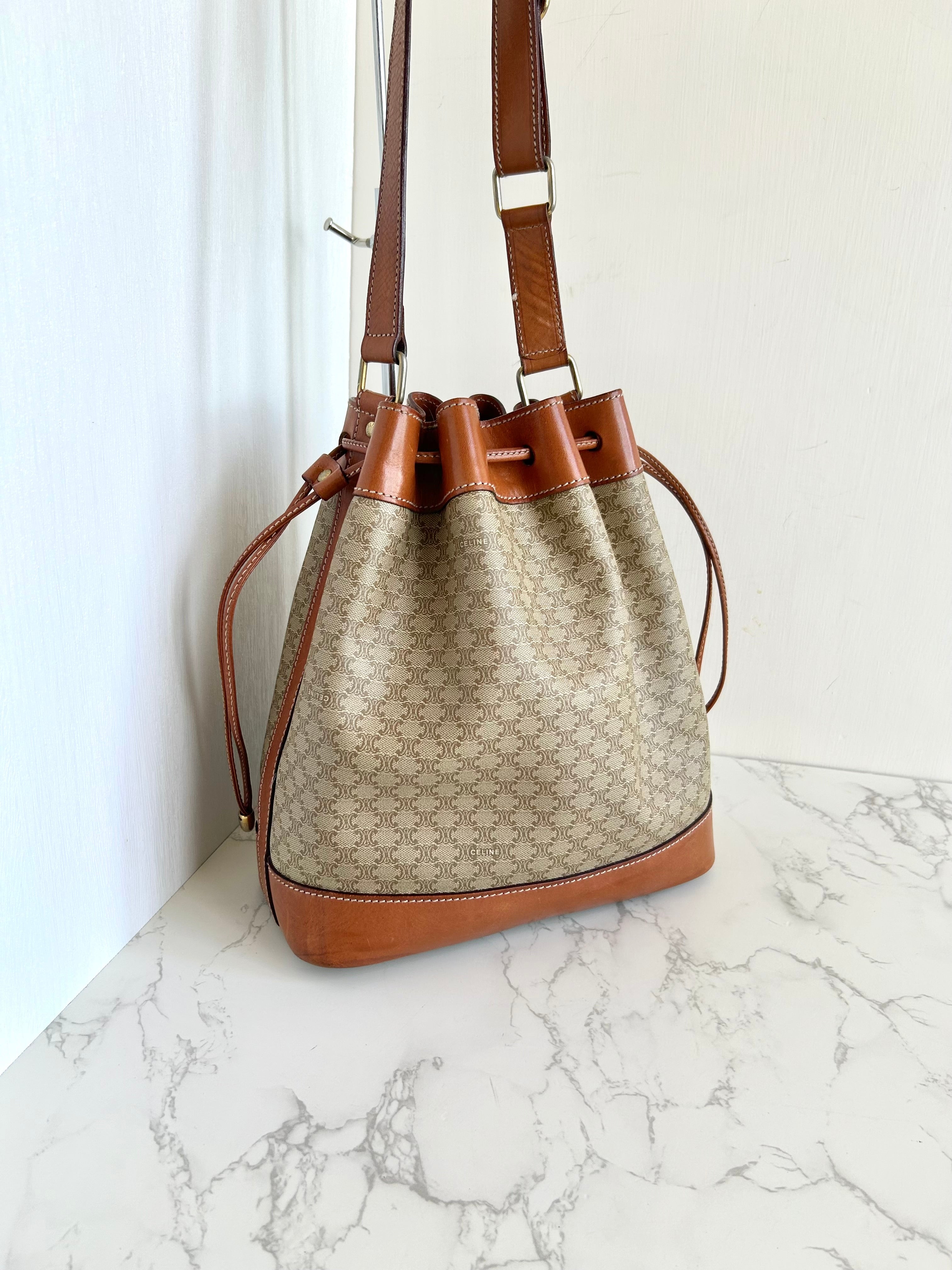CELINE beige old flower leather shoulder drawstring bucket bag / side backpack