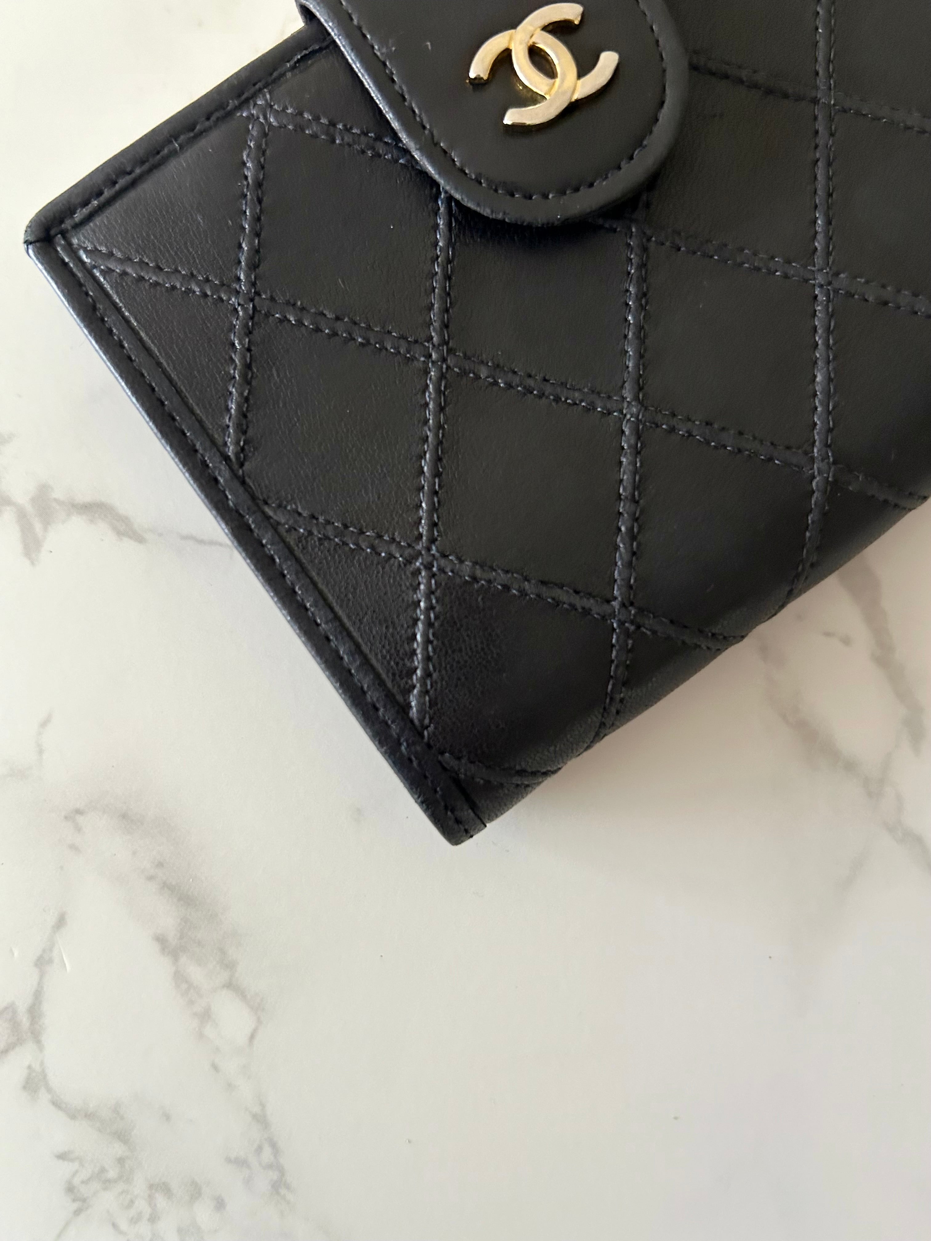 CHANEL rare black lambskin leather large gold buckle gold label short wallet / wallet