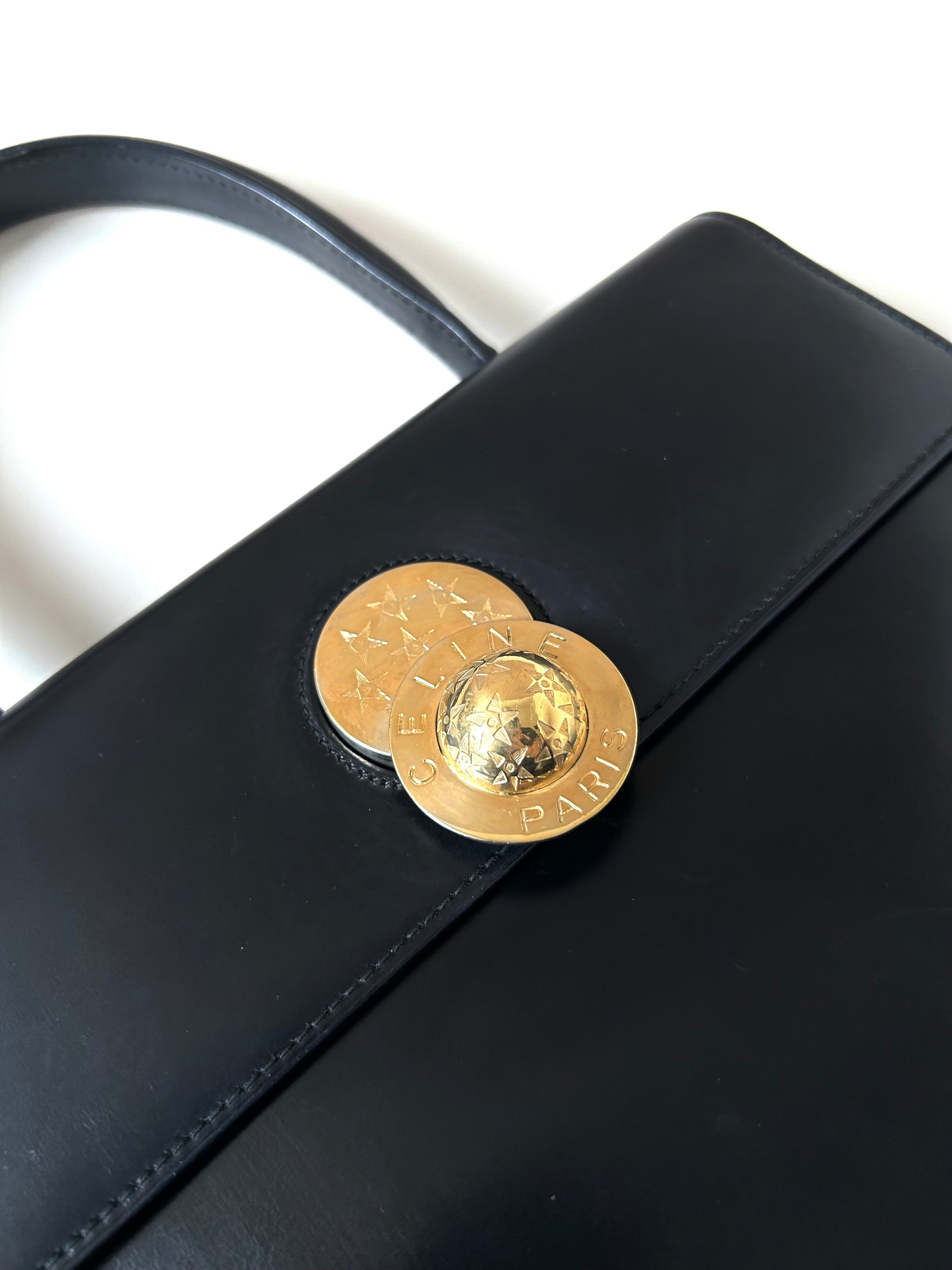 CELINE rare rotating moving gold planet black leather Kelly small bag / handbag