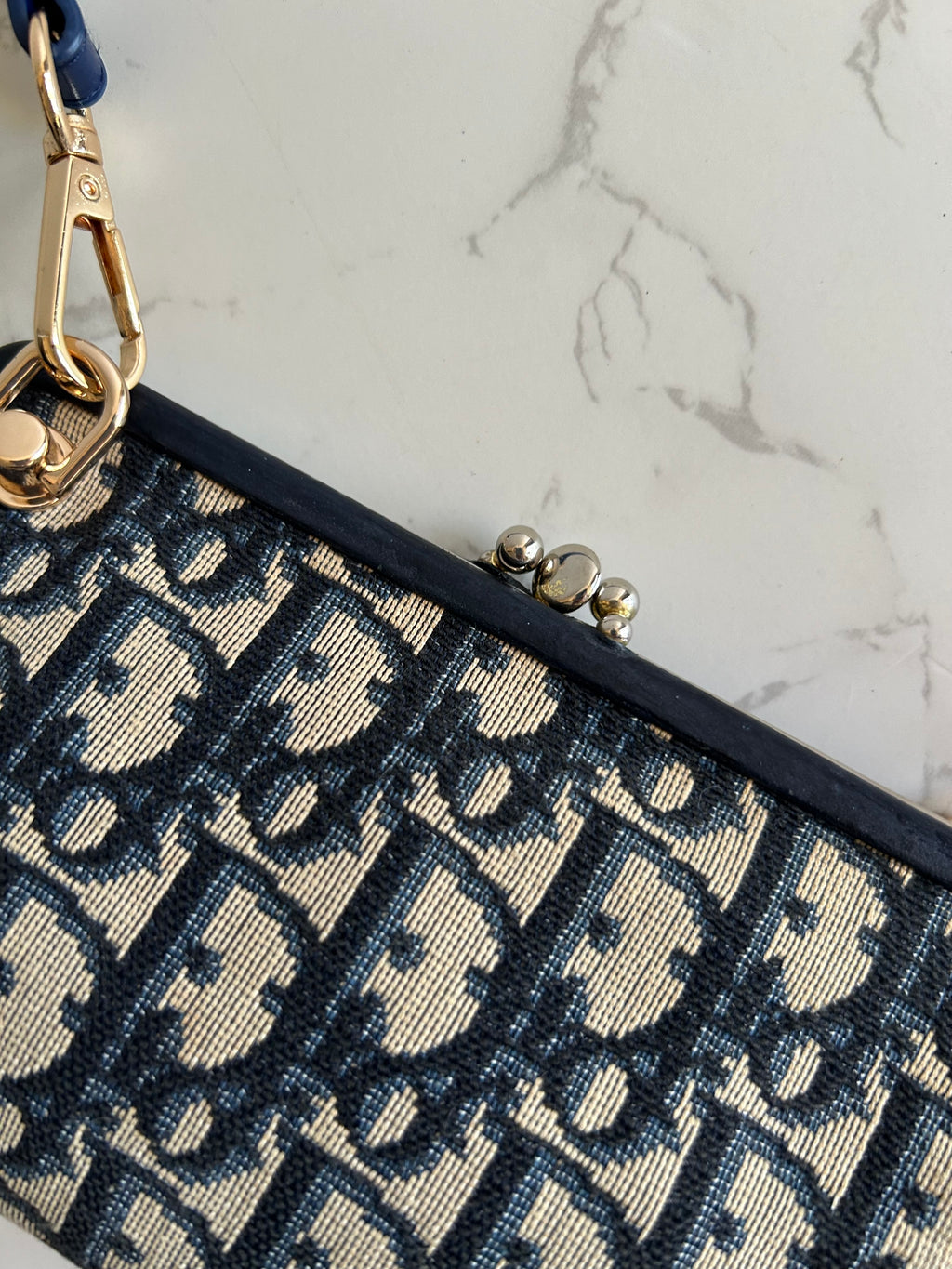 CHRISTIAN DIOR dark blue old flower mouth gold dumpling side bag / clutch bag / oblique bag
