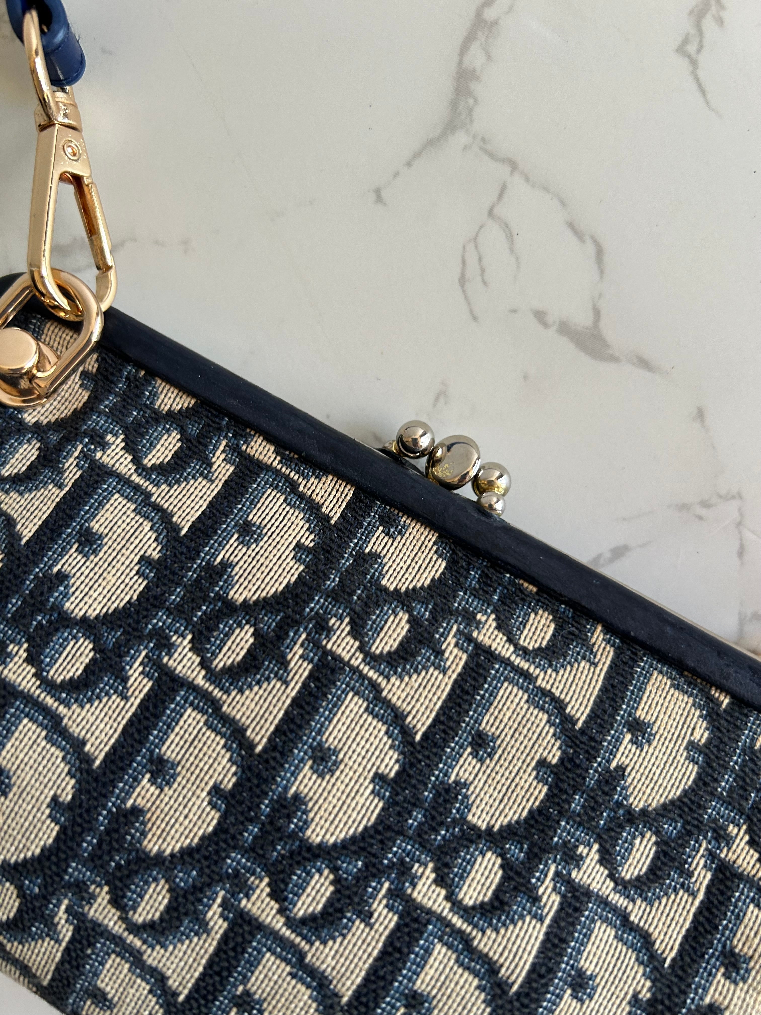 CHRISTIAN DIOR dark blue old flower mouth gold dumpling side bag / clutch bag / oblique bag
