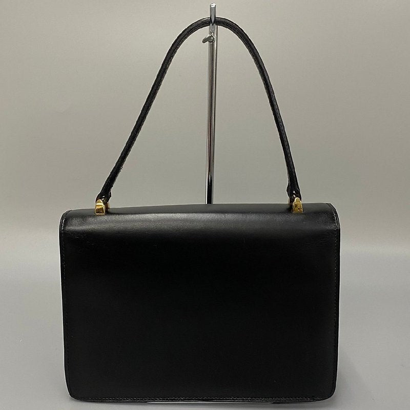 CELINE rare rotating golden planet black leather small bag / side backpack / underarm bag