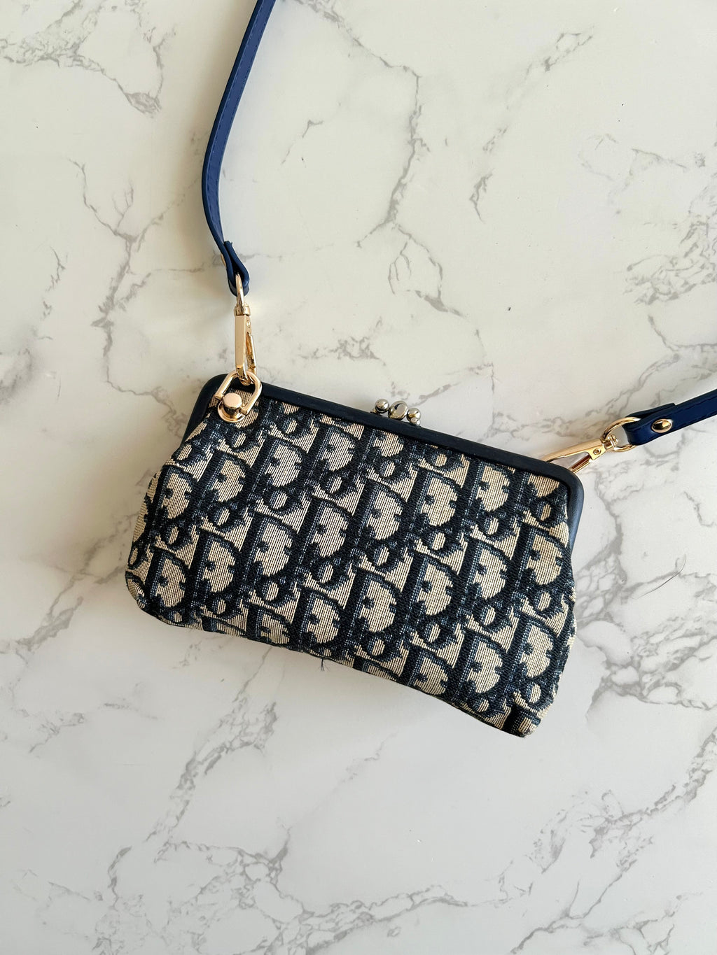 CHRISTIAN DIOR dark blue old flower mouth gold dumpling side bag / clutch bag / oblique bag