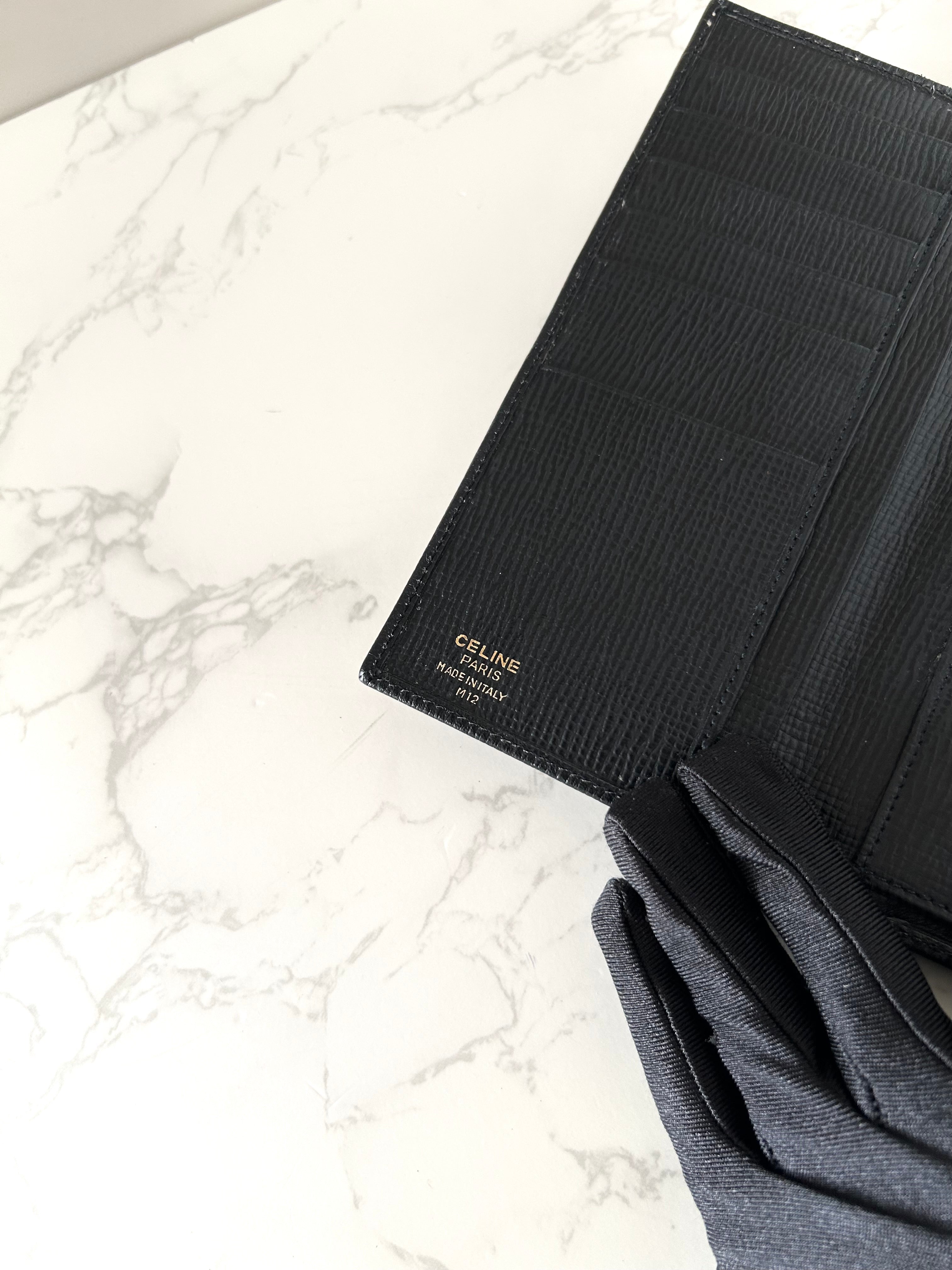 CELINE black gold ring leather long wallet / wallet