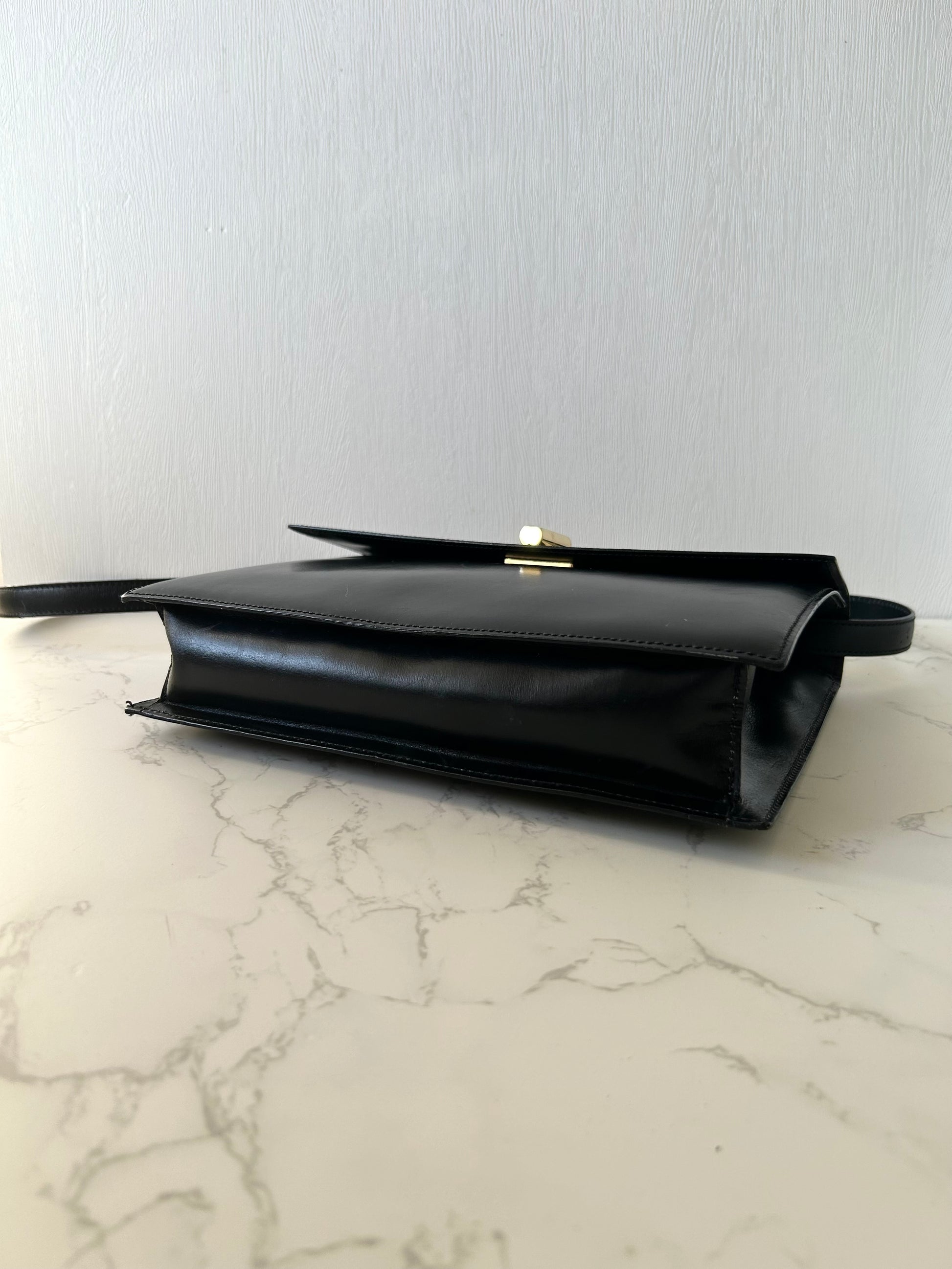 CELINE rare black cross rotating gold buckle leather small shoulder bag / crossbody bag