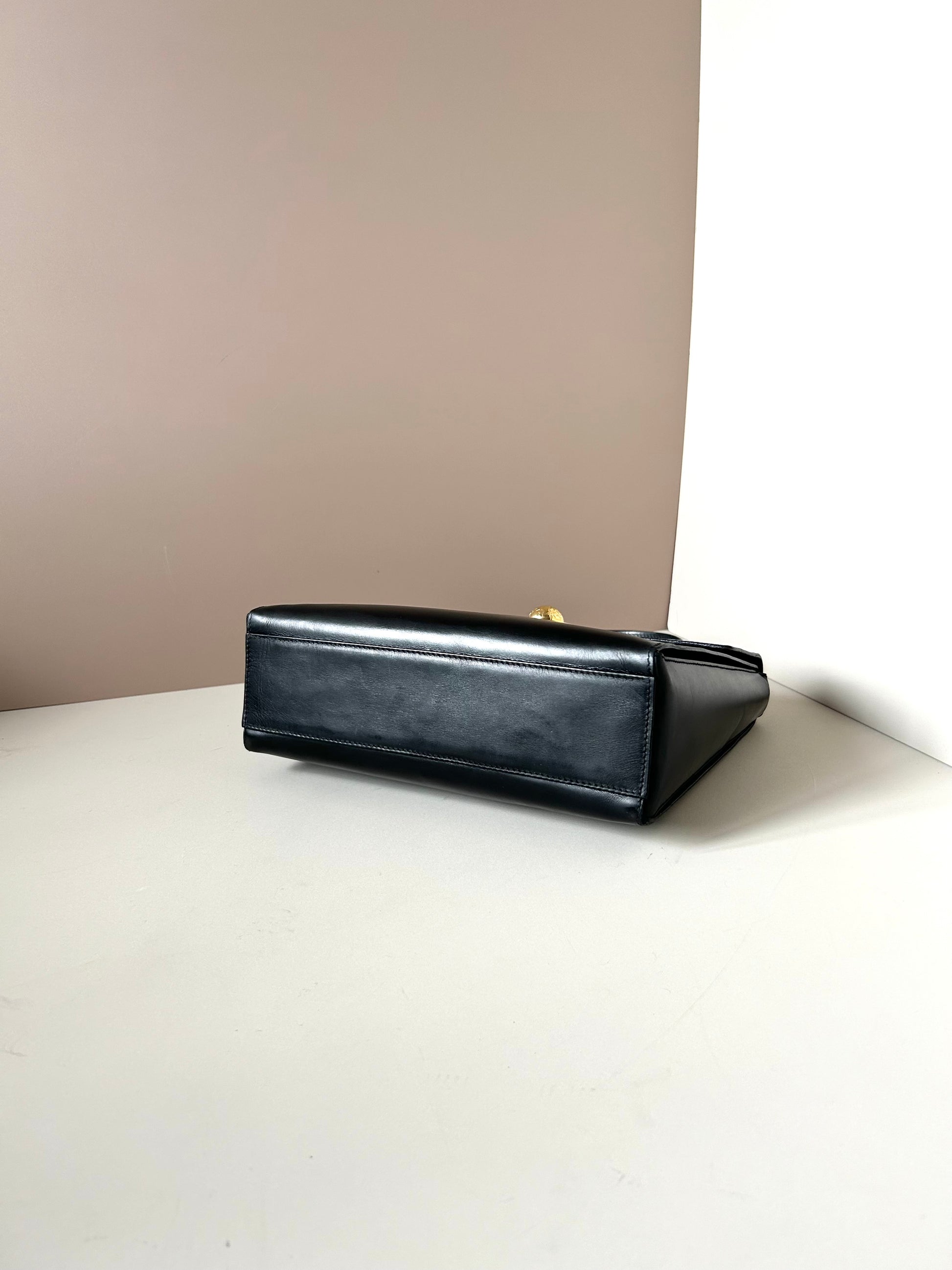 CELINE rare rotating moving gold planet black leather Kelly small bag / handbag