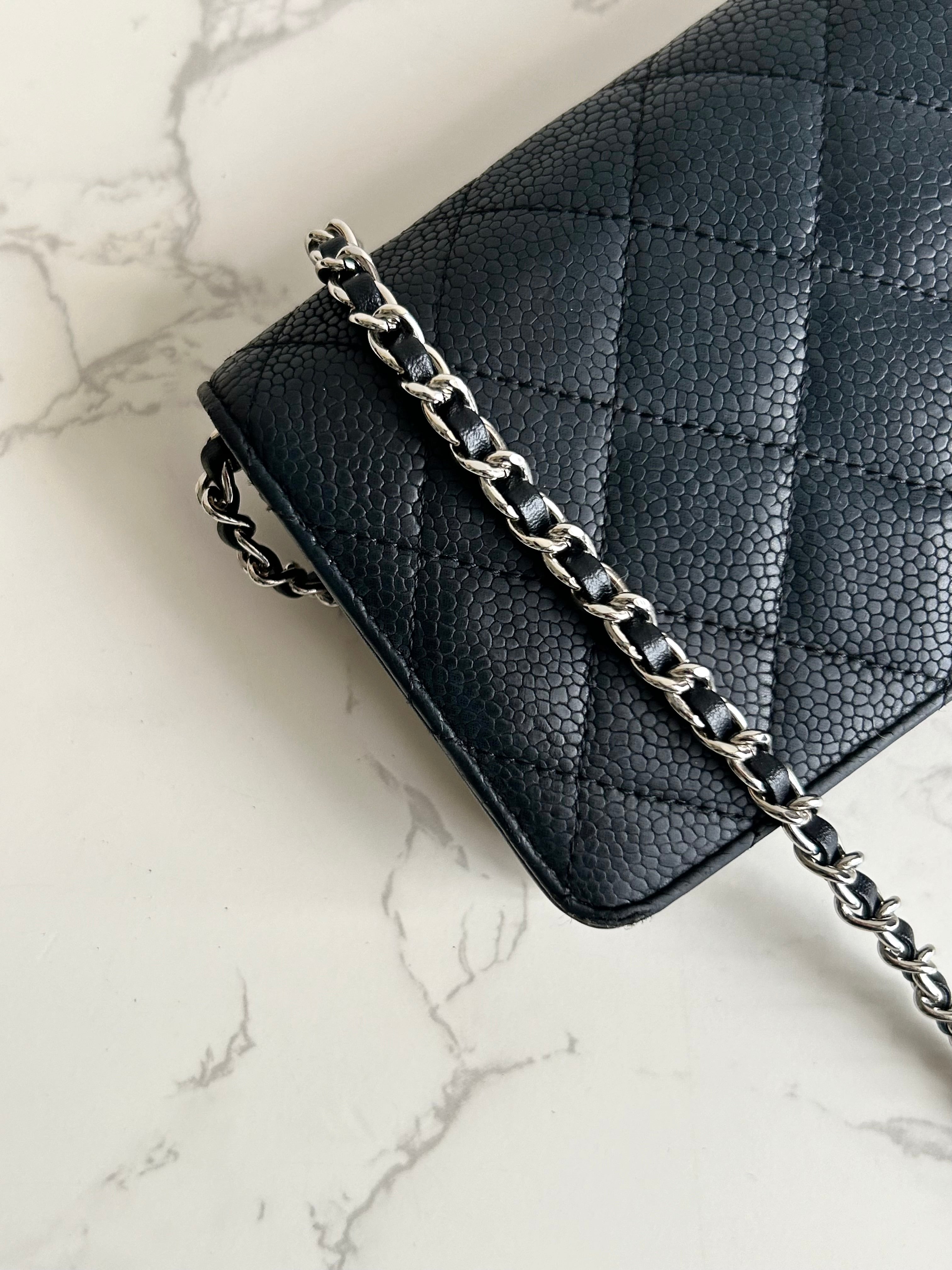 CHANEL black silver buckle caviar leather WOC long wallet / oblique bag / side bag