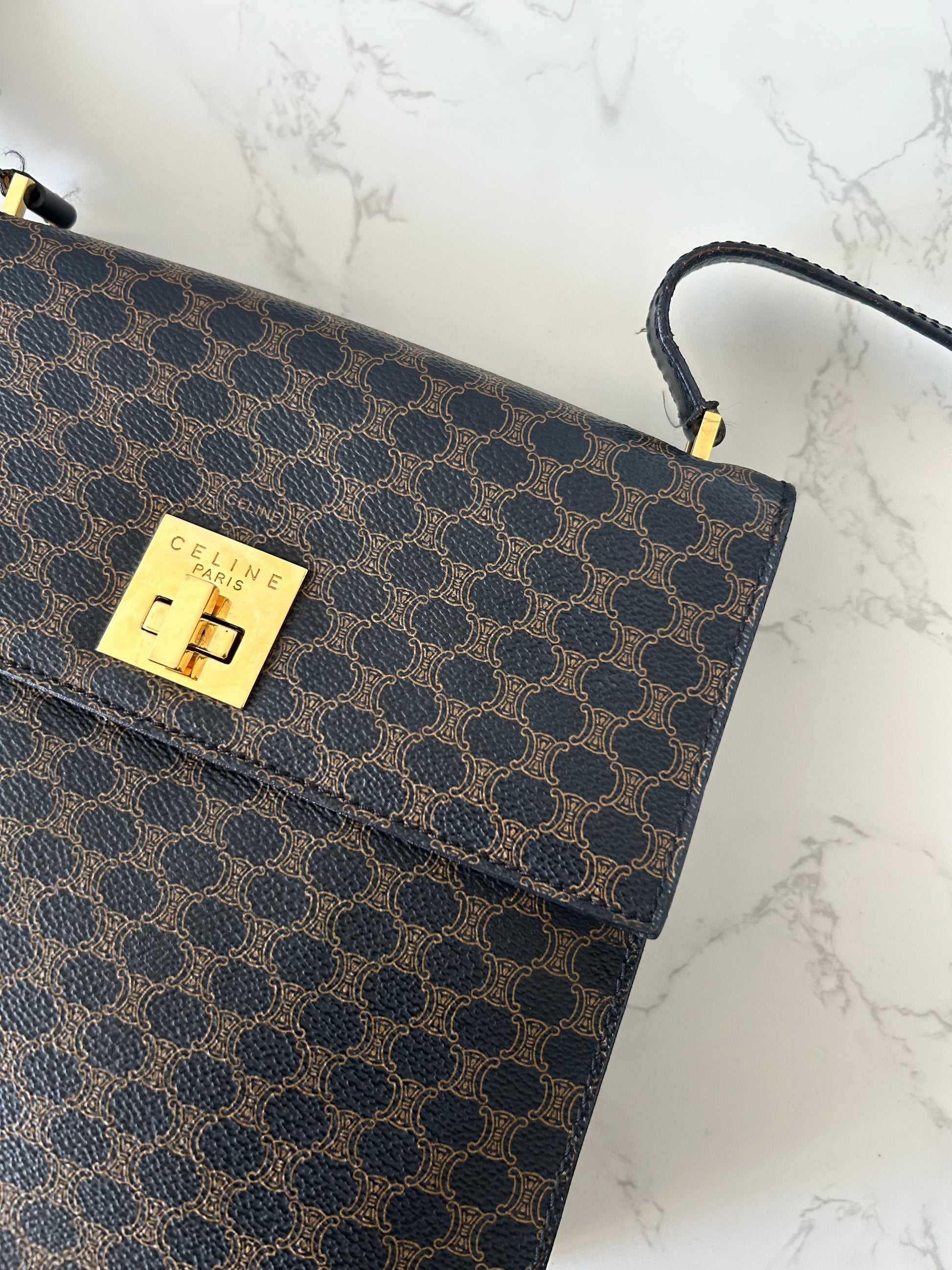 CELINE rare black old flower gold rotating buckle leather Kelly side bag / oblique bag