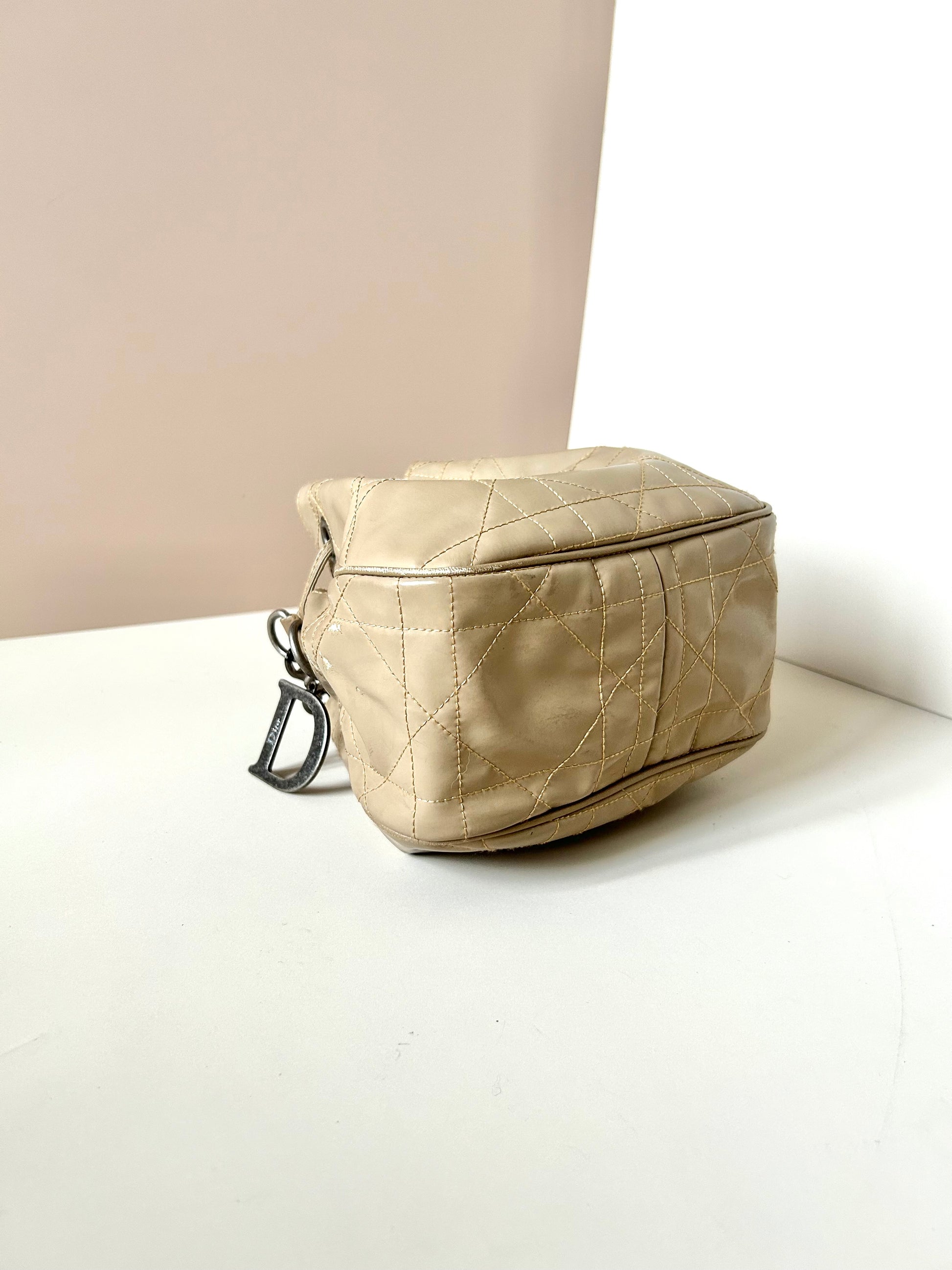 CHRISTIAN DOR beige leather silver buckle drawstring small bucket bag / side backpack / shoulder bag