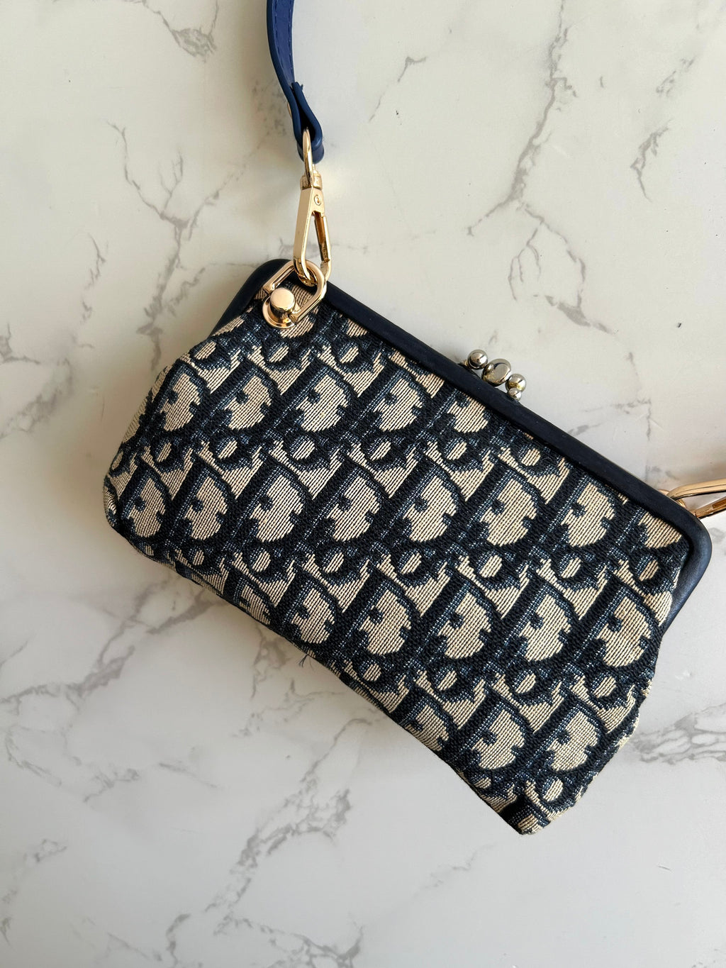 CHRISTIAN DIOR dark blue old flower mouth gold dumpling side bag / clutch bag / oblique bag