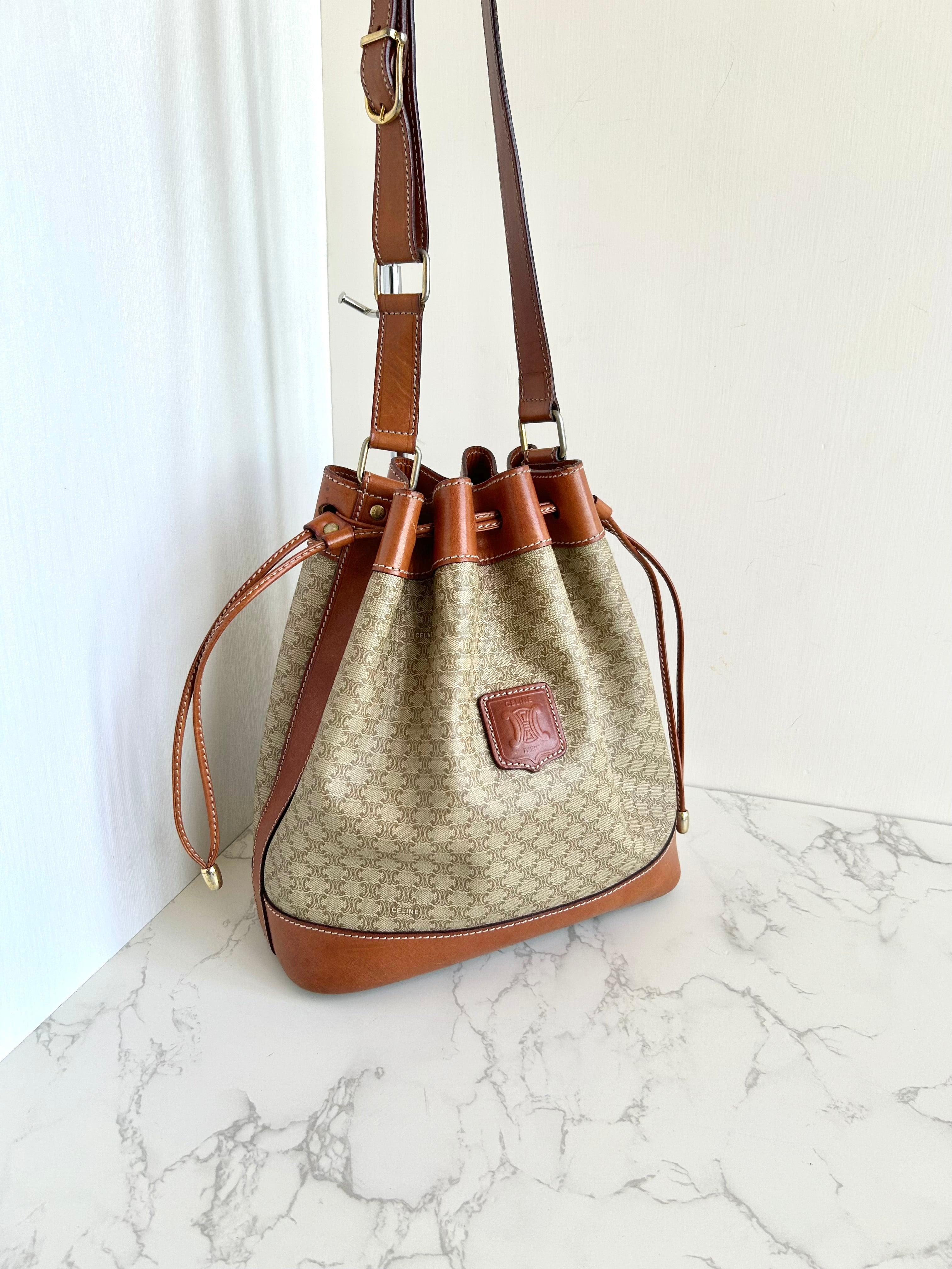CELINE beige old flower leather shoulder drawstring bucket bag / side backpack