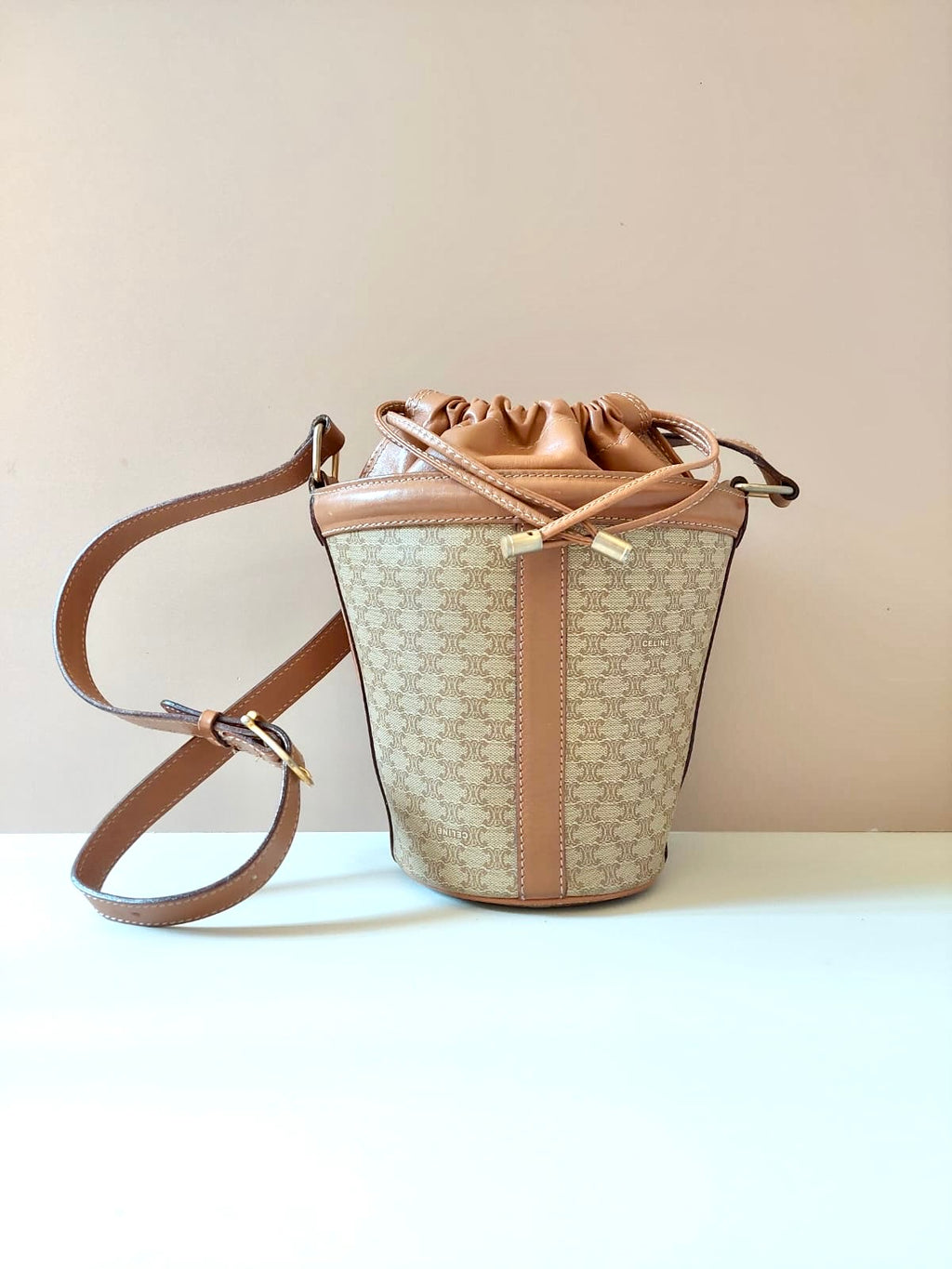 CELINE beige old flower leather drawstring bucket bag / side backpack