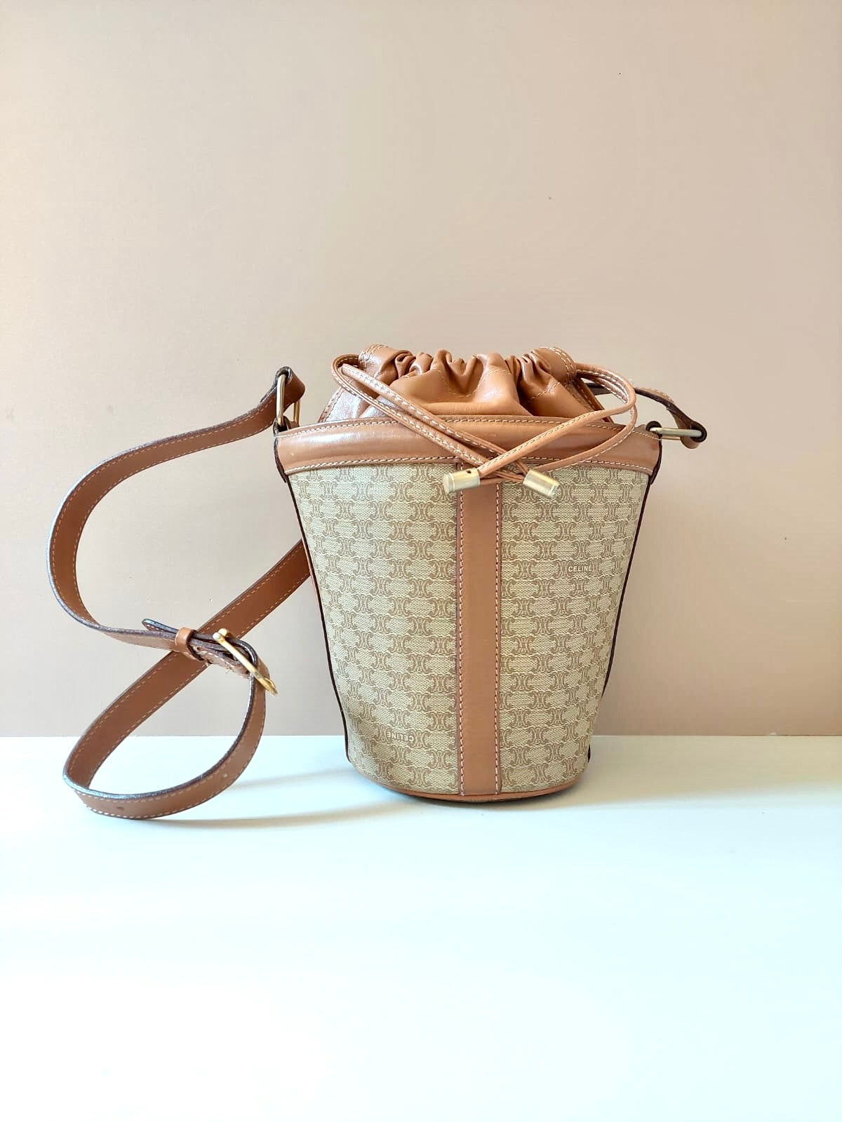 CELINE beige old flower leather drawstring bucket bag / side backpack