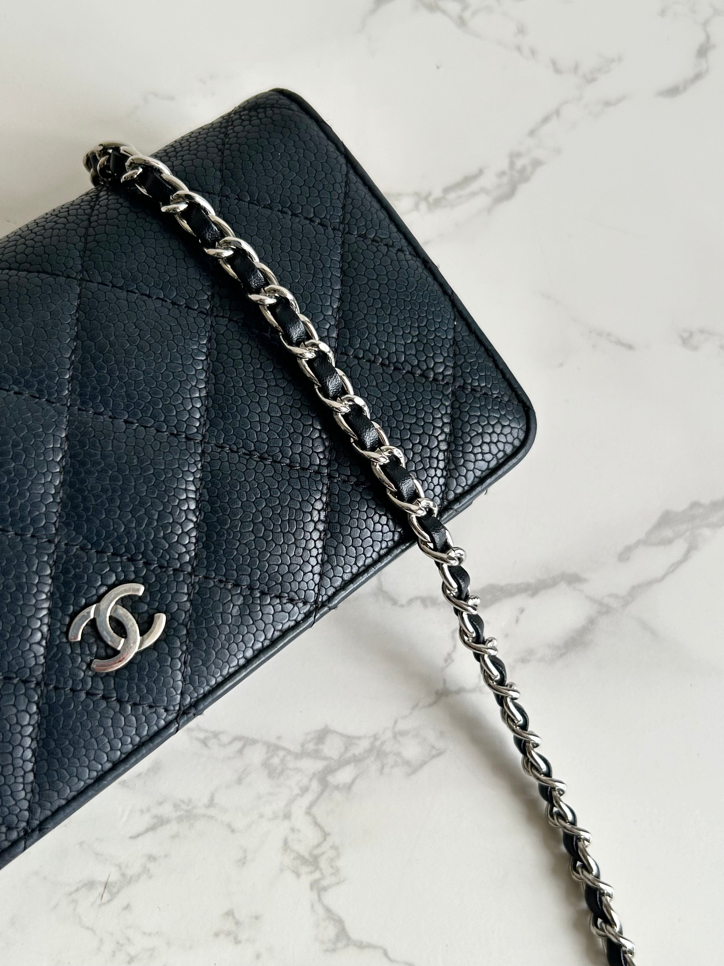 CHANEL black silver buckle caviar leather WOC long wallet / oblique bag / side bag