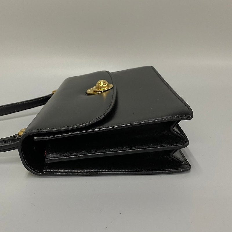 CELINE rare rotating golden planet black leather small bag / side backpack / underarm bag