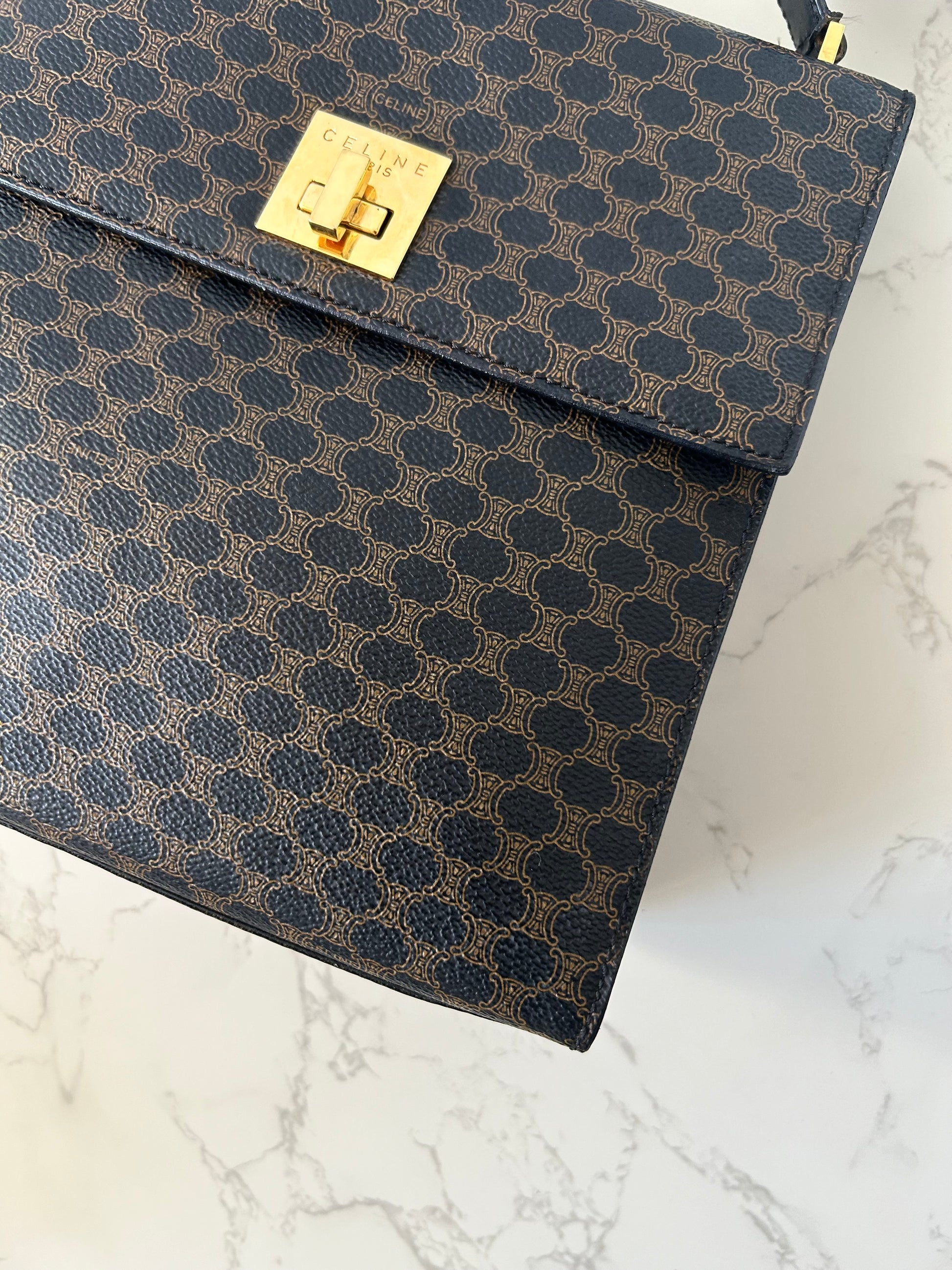 CELINE rare black old flower gold rotating buckle leather Kelly side bag / oblique bag