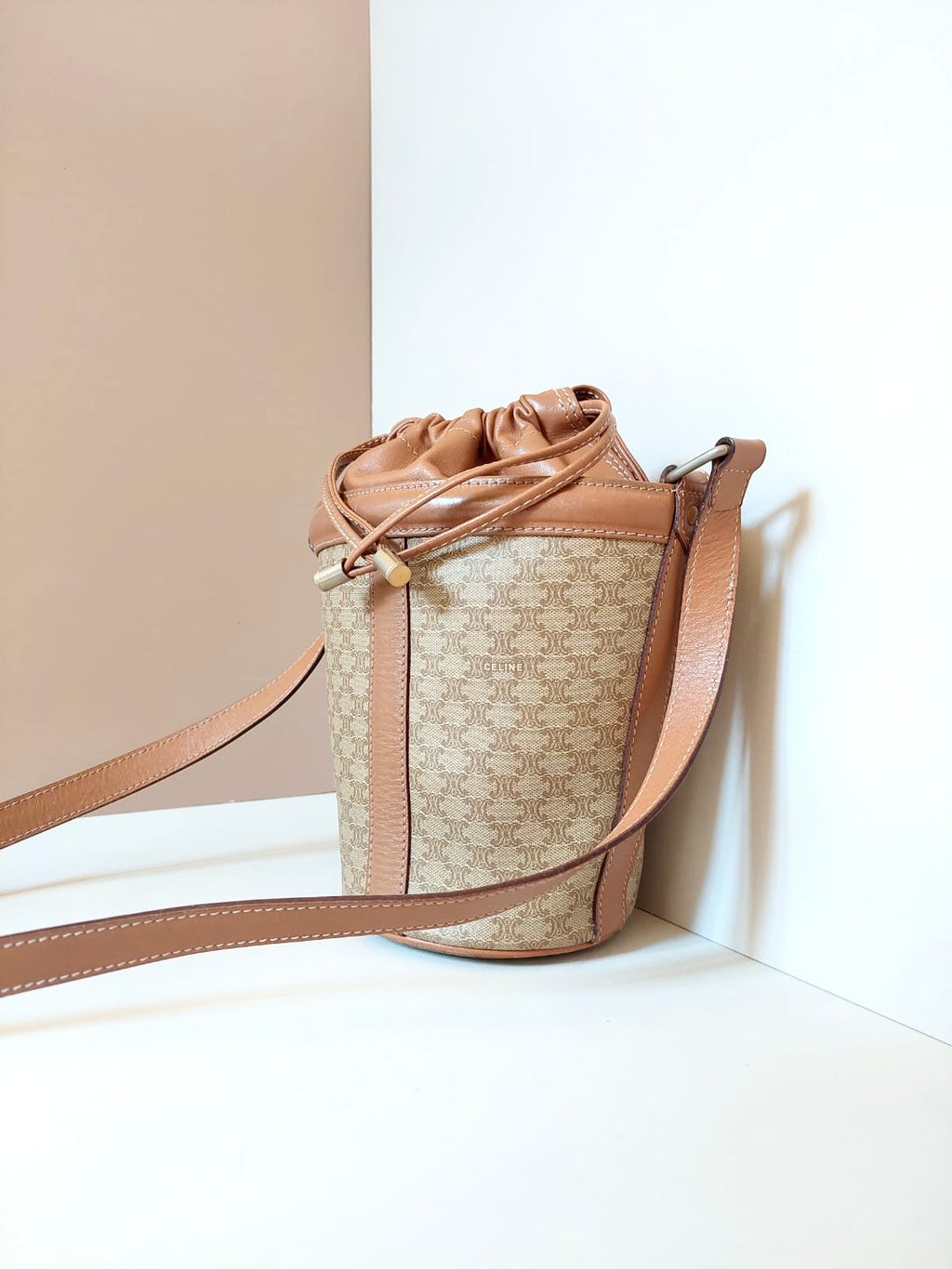 CELINE beige old flower leather drawstring bucket bag / side backpack