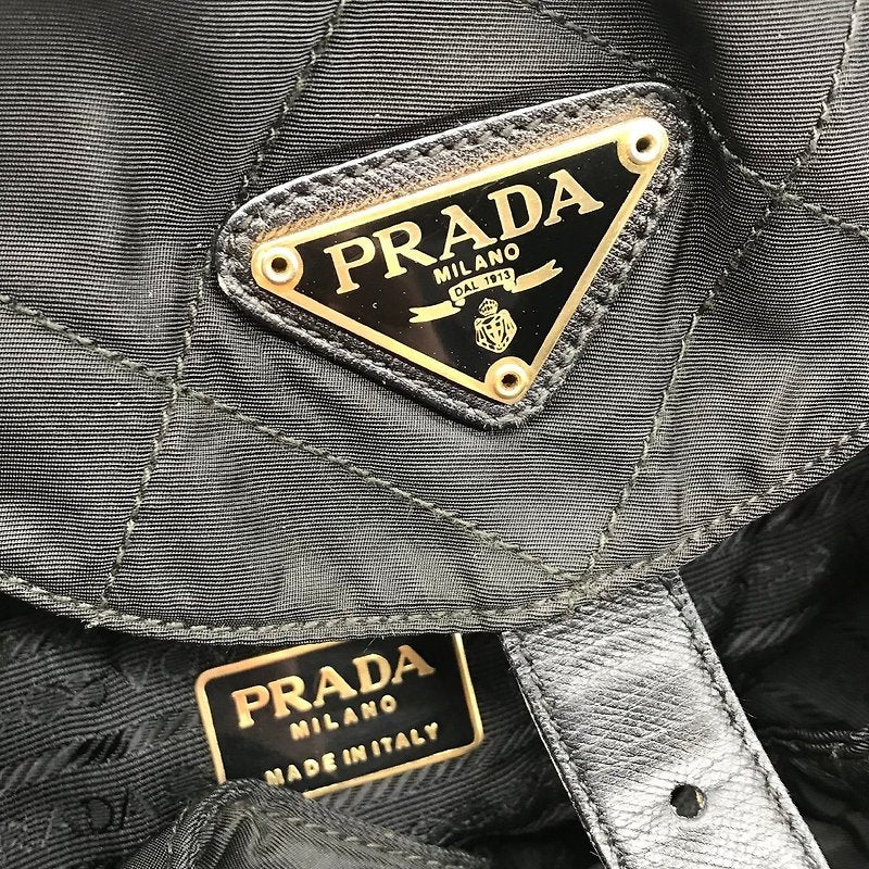 PRADA black gold triangle check nylon men's and women's backpack/backpack