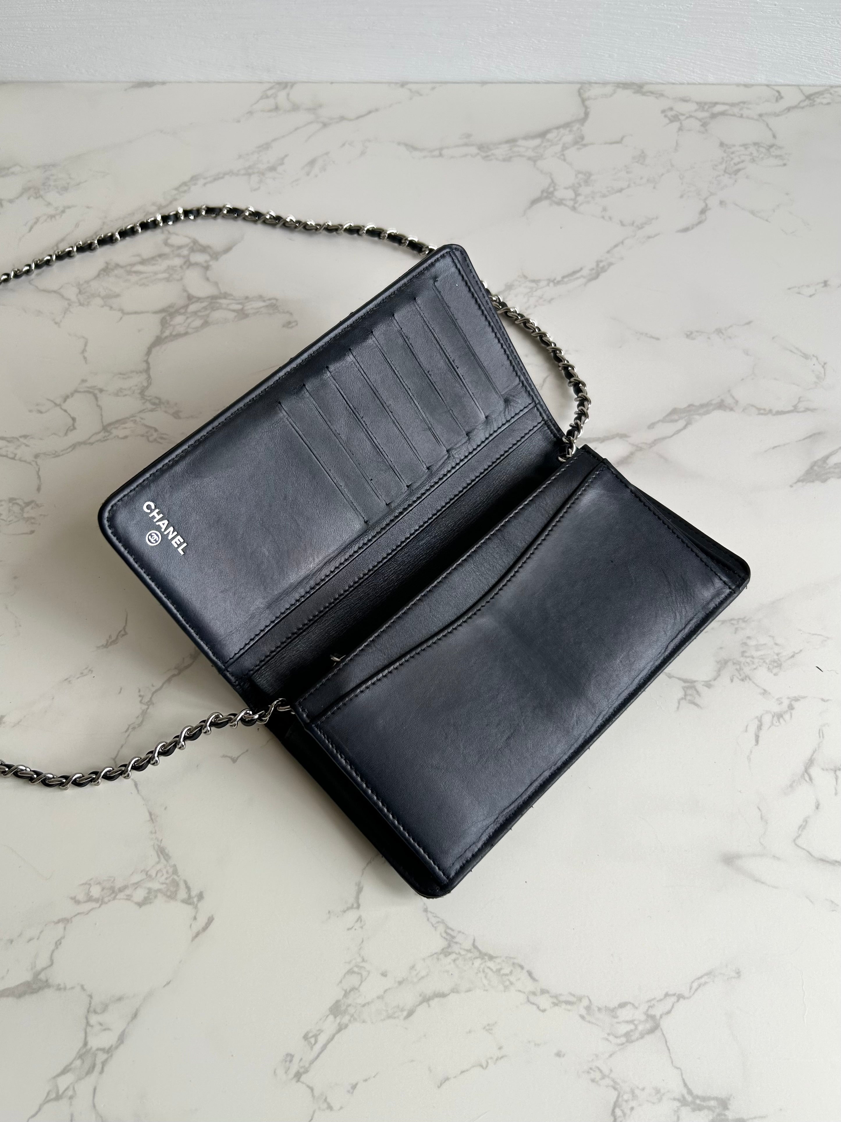 CHANEL black silver buckle caviar leather WOC long wallet / oblique bag / side bag