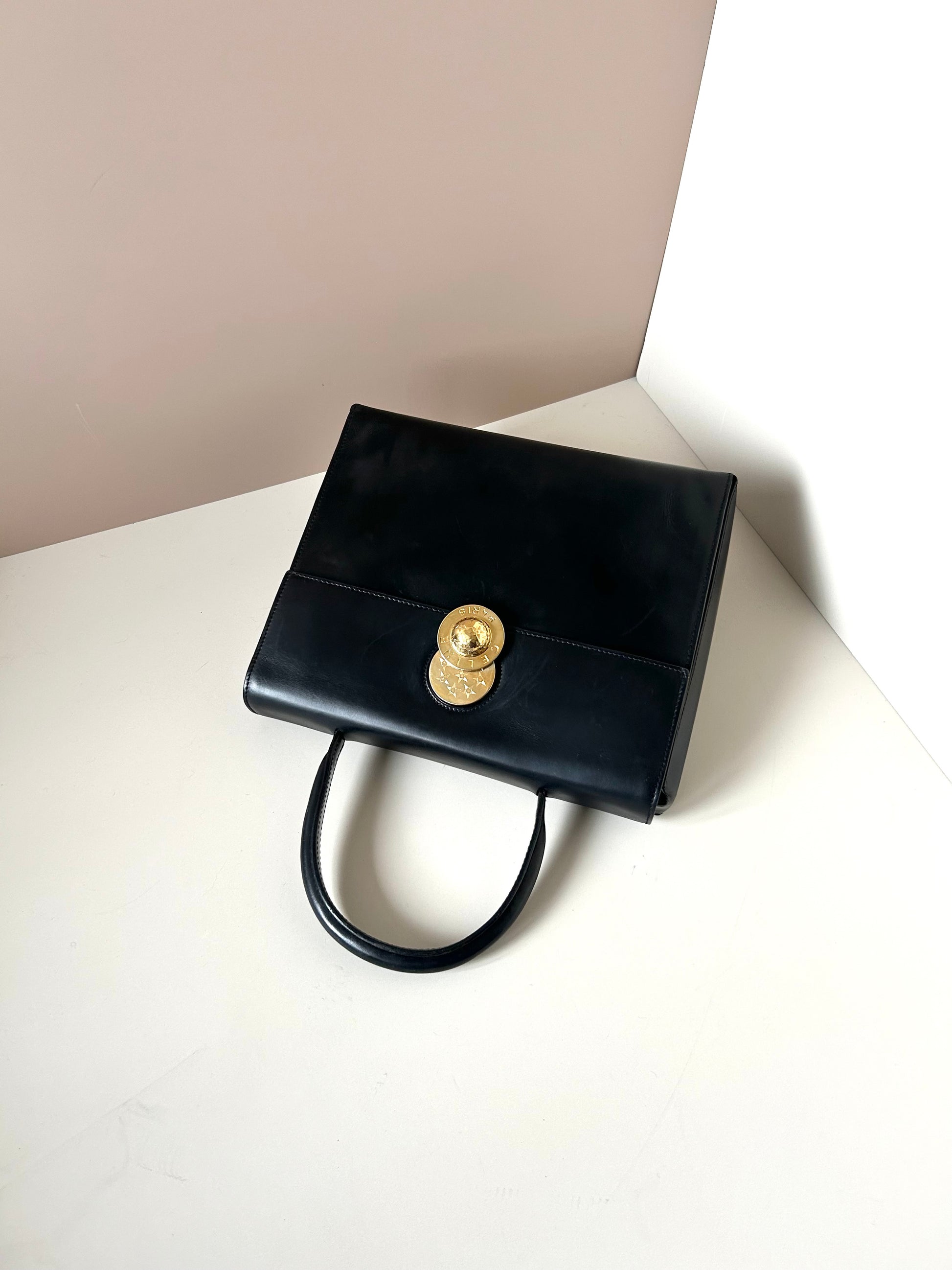 CELINE rare rotating moving gold planet black leather Kelly small bag / handbag