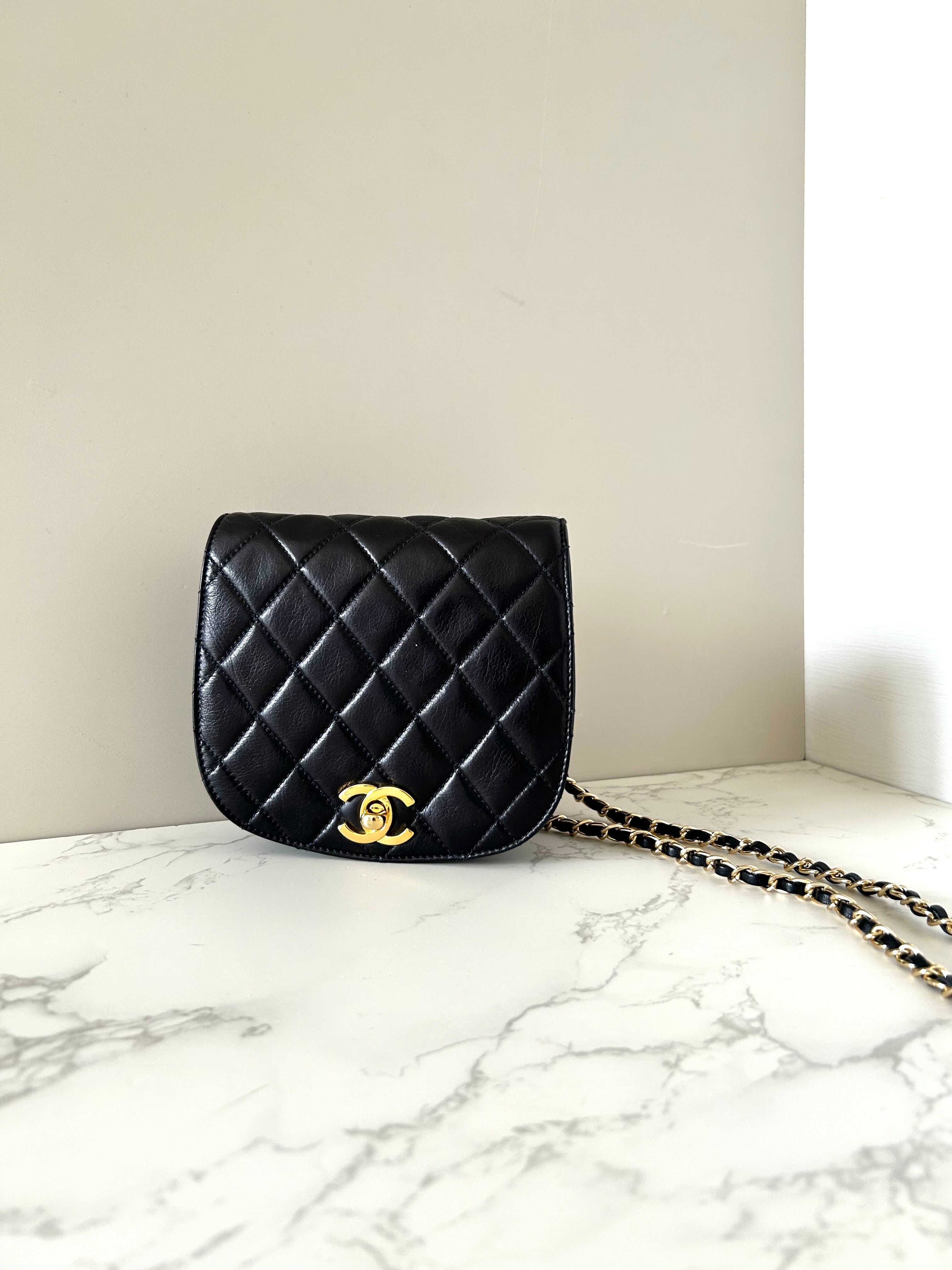 CHANEL rare black lambskin leather swivel buckle saddle bag / clutch / oblique bag