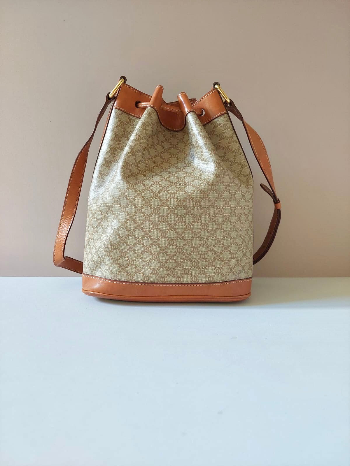 CELINE beige old flower leather shoulder drawstring bucket bag / side backpack / shoulder bag