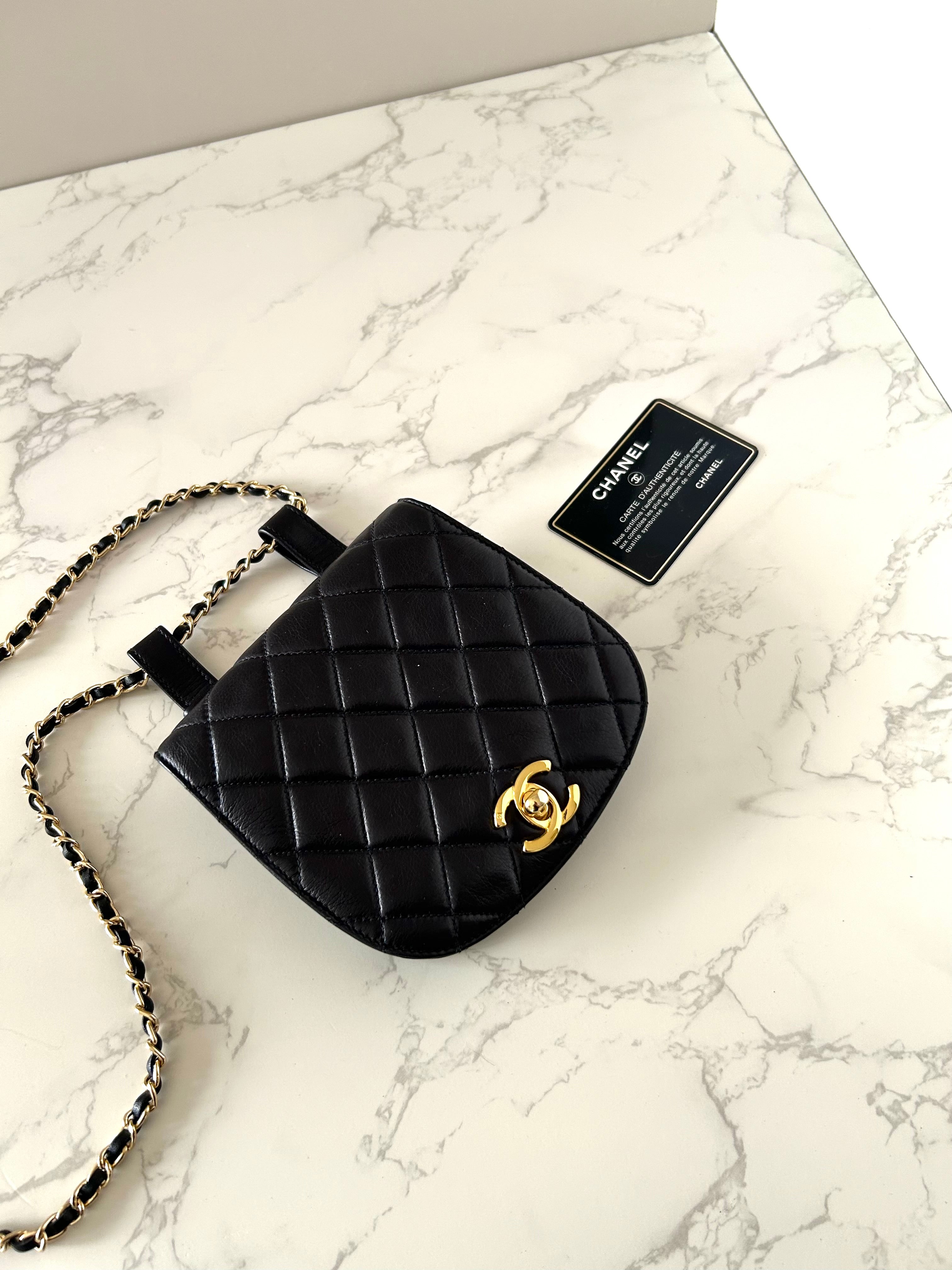 CHANEL rare black lambskin leather swivel buckle saddle bag / clutch / oblique bag