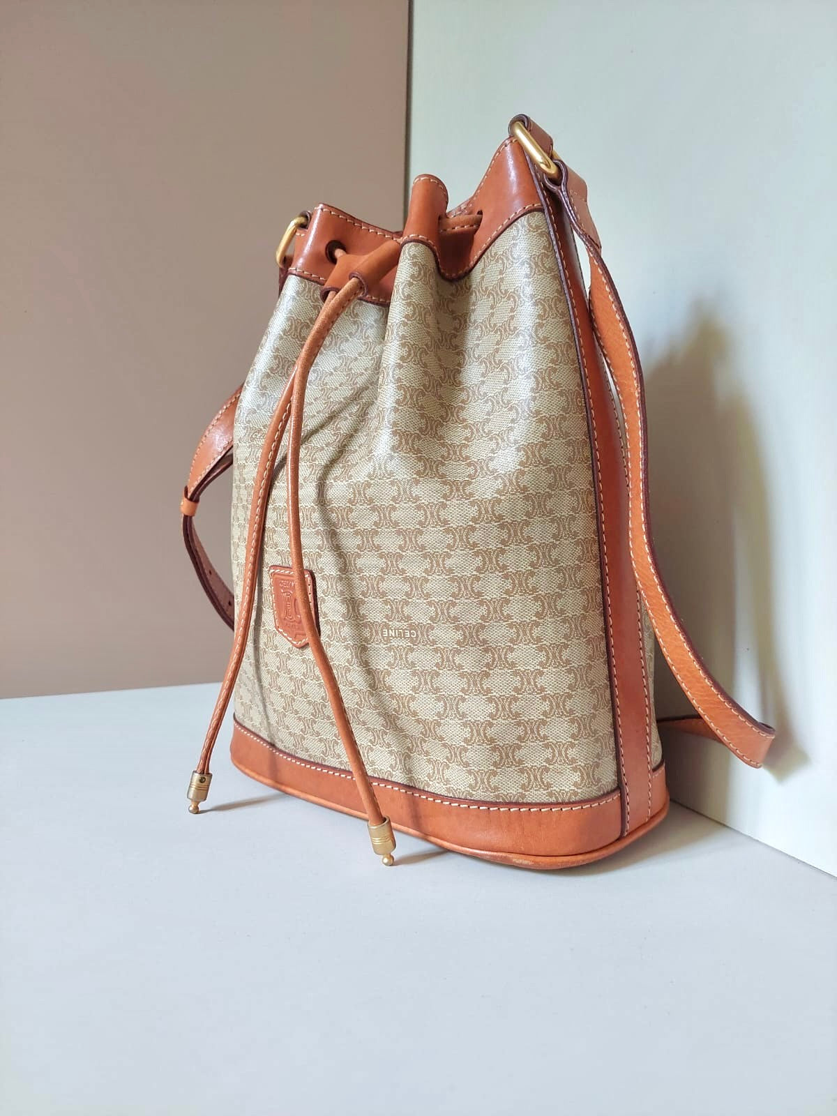 CELINE beige old flower leather shoulder drawstring bucket bag / side backpack / shoulder bag