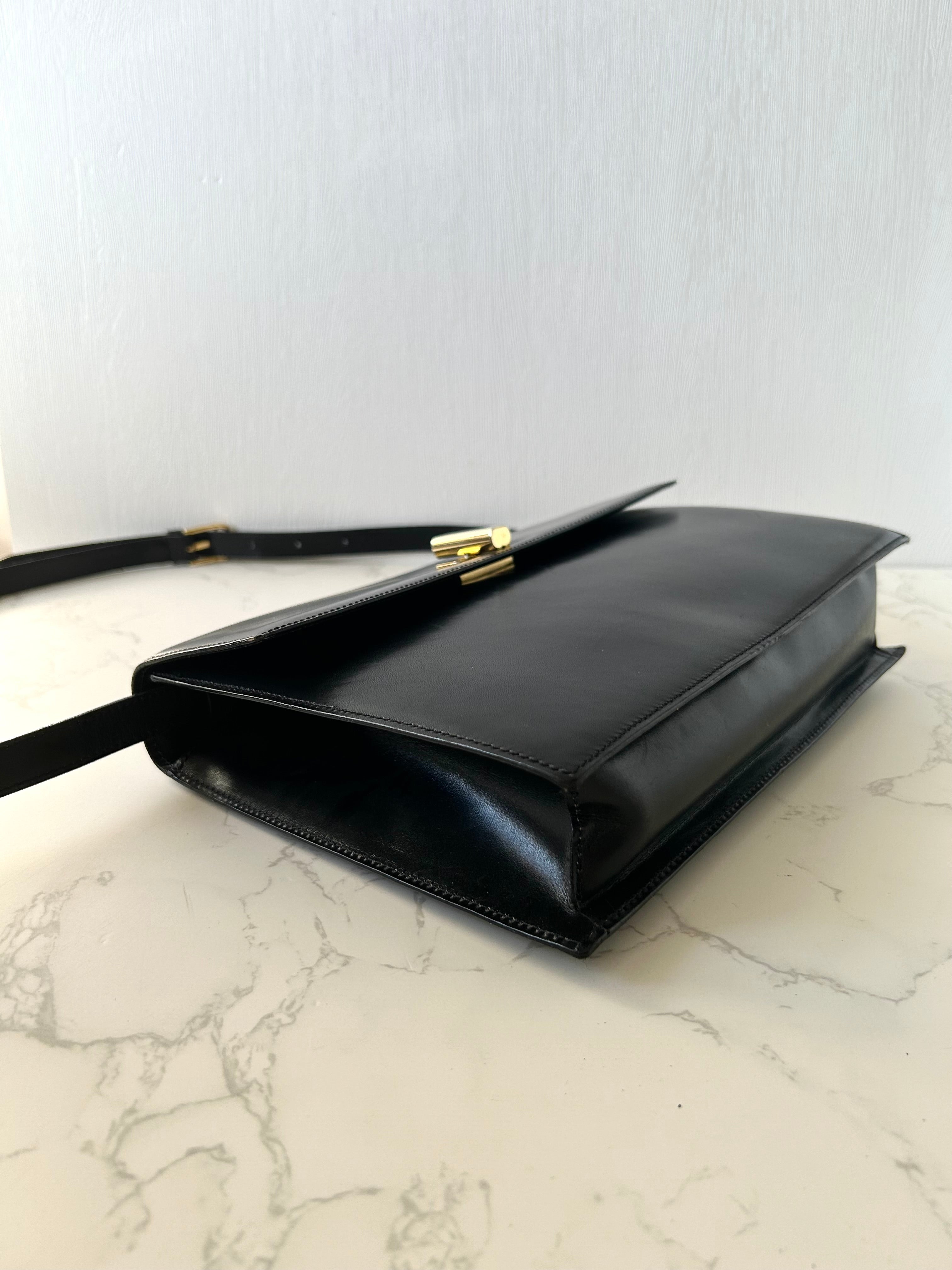 CELINE rare black cross rotating gold buckle leather small shoulder bag / crossbody bag