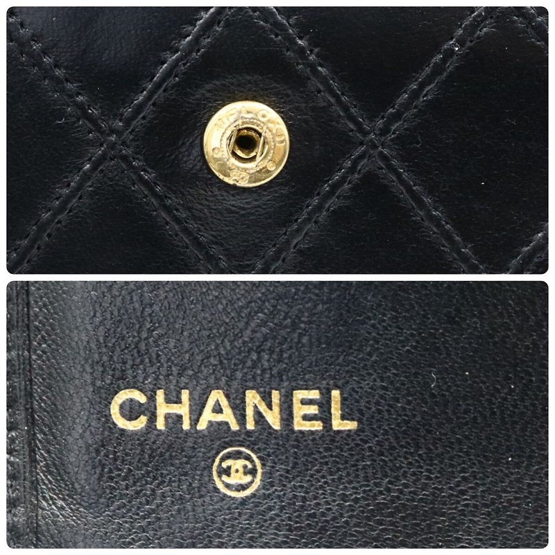 CHANEL rare black lambskin leather large gold buckle gold label short wallet / wallet