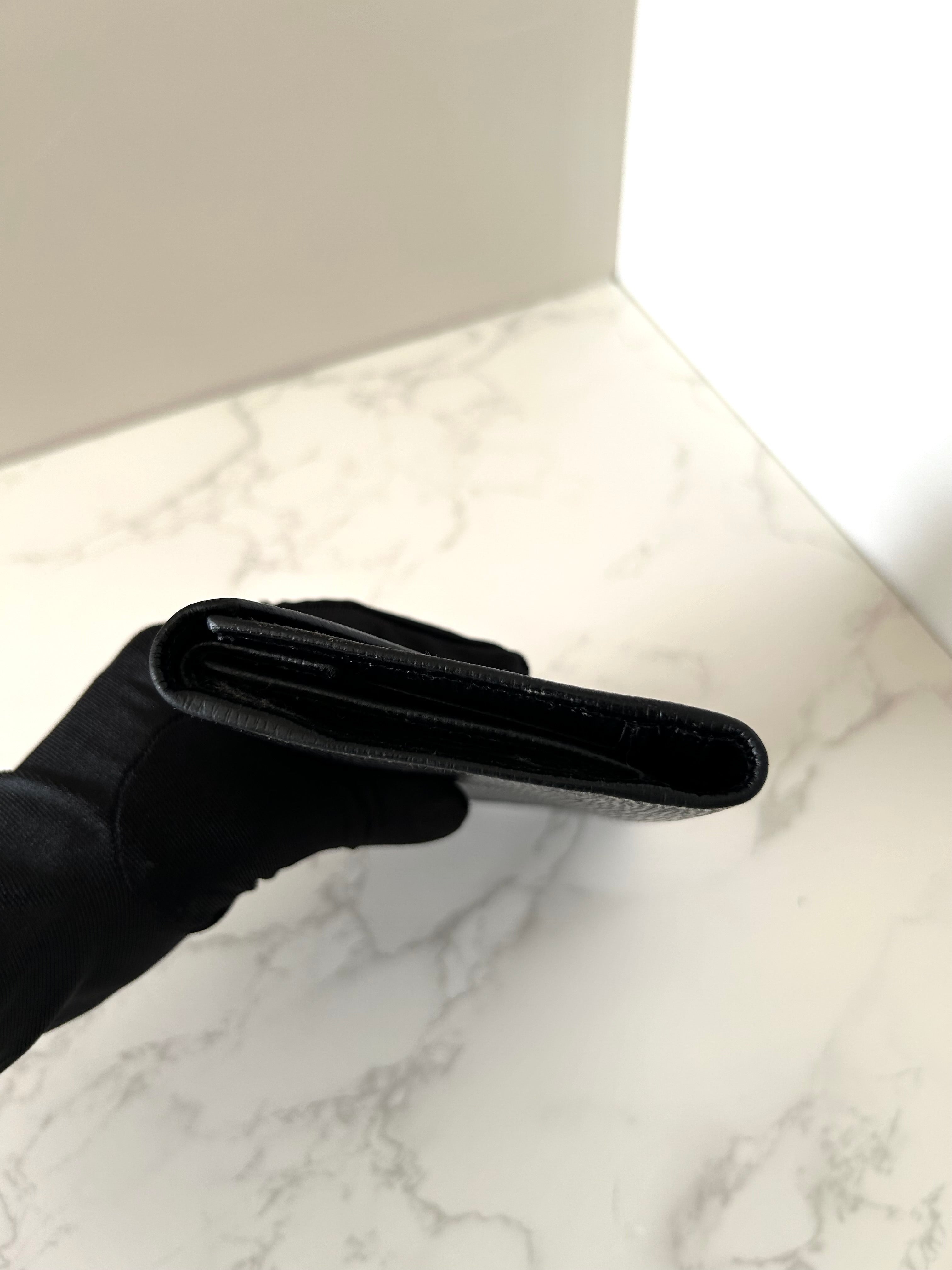 CELINE black gold ring leather long wallet / wallet