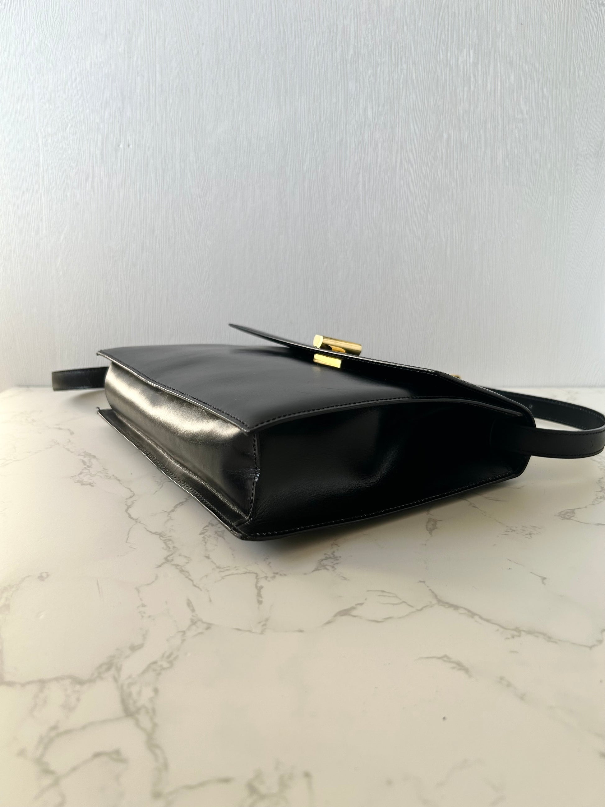 CELINE rare black cross rotating gold buckle leather small shoulder bag / crossbody bag