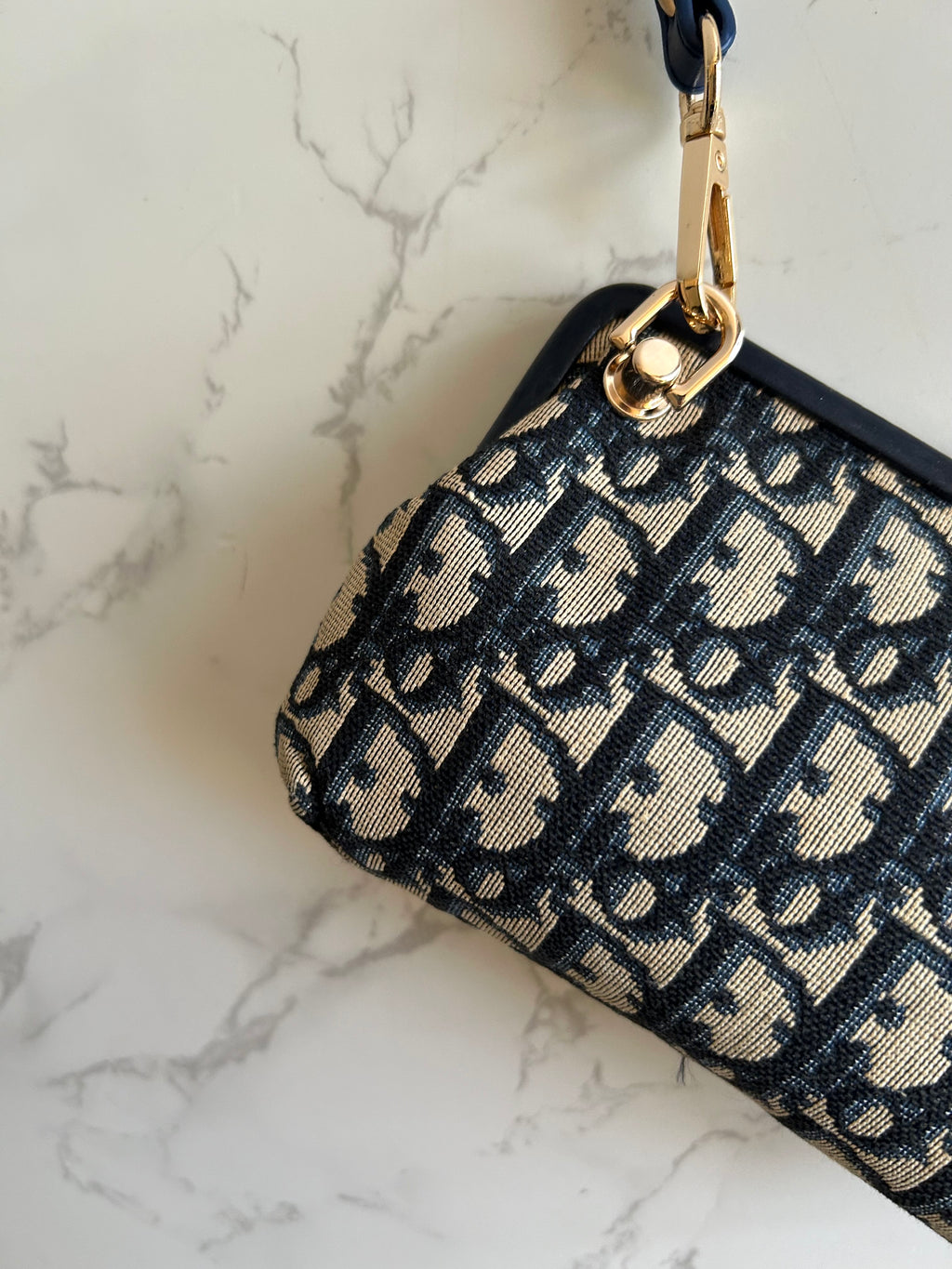 CHRISTIAN DIOR dark blue old flower mouth gold dumpling side bag / clutch bag / oblique bag