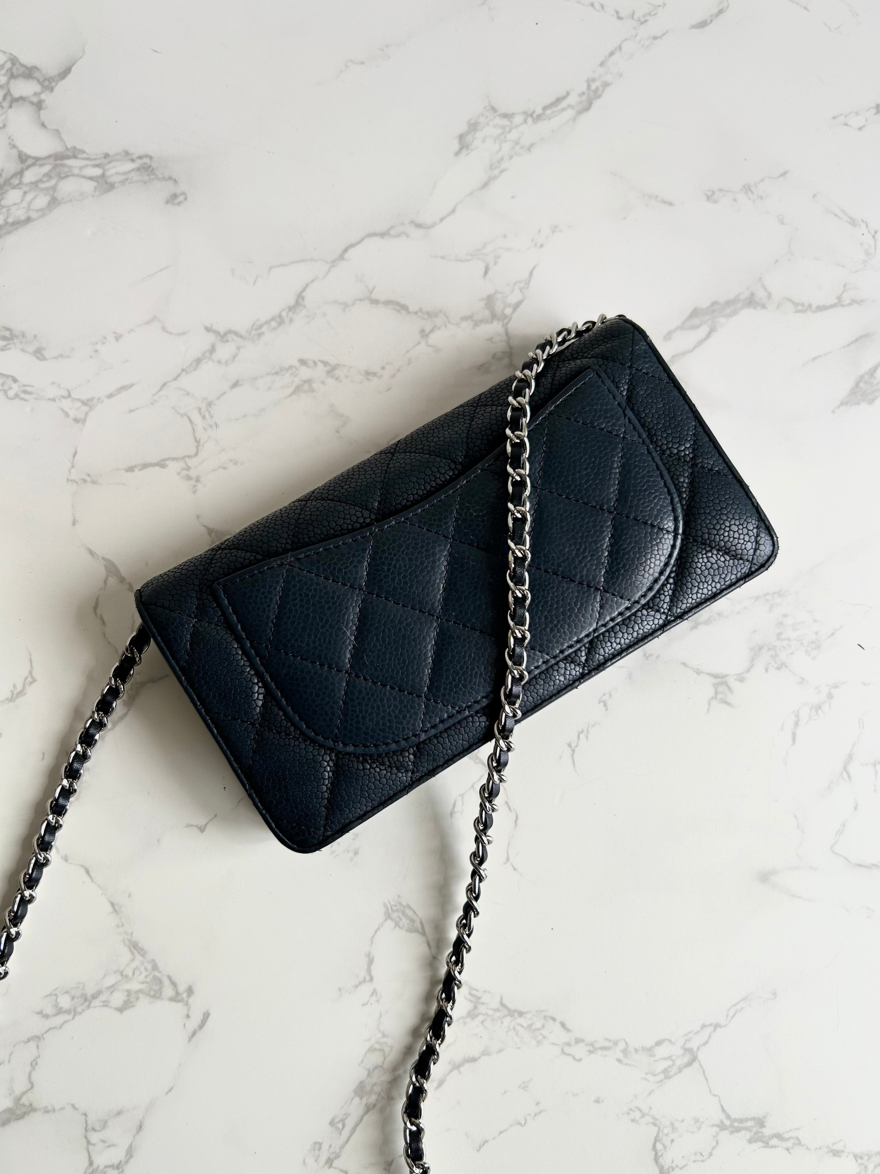 CHANEL black silver buckle caviar leather WOC long wallet / oblique bag / side bag