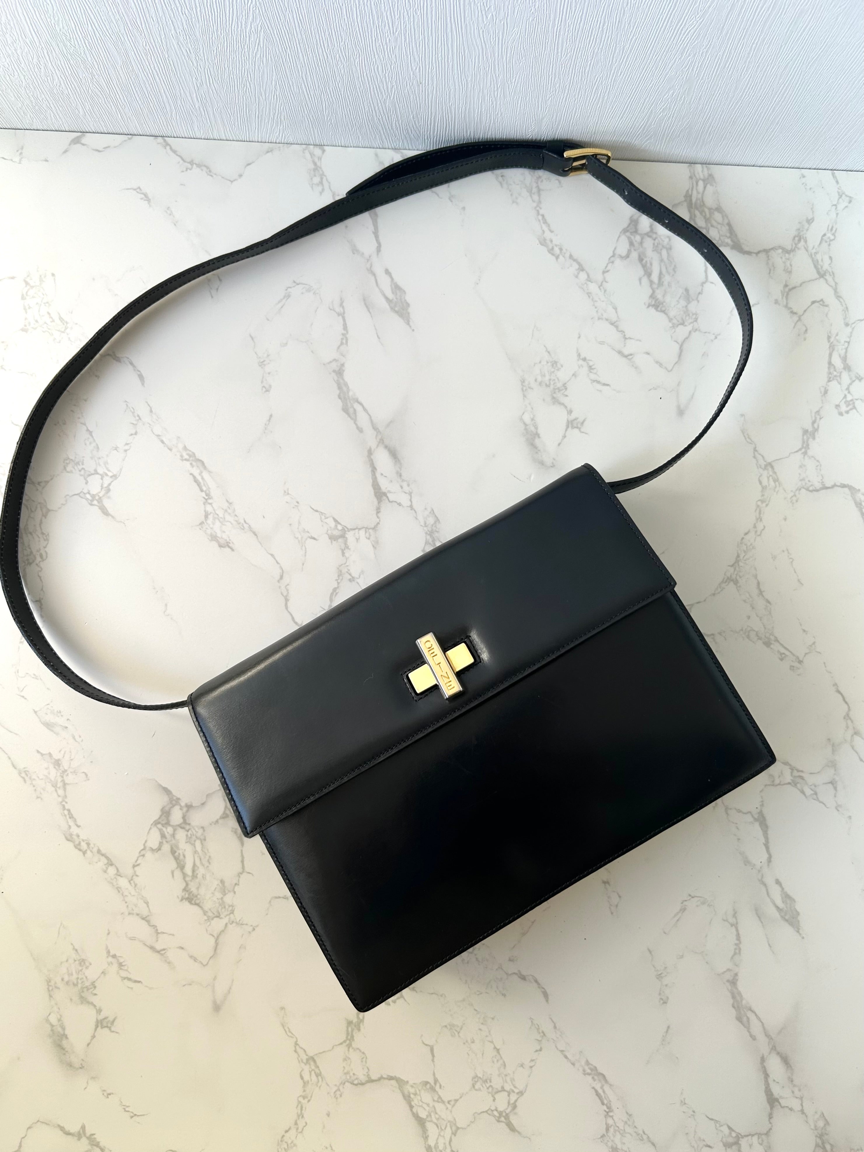 CELINE rare black cross rotating gold buckle leather small shoulder bag / crossbody bag