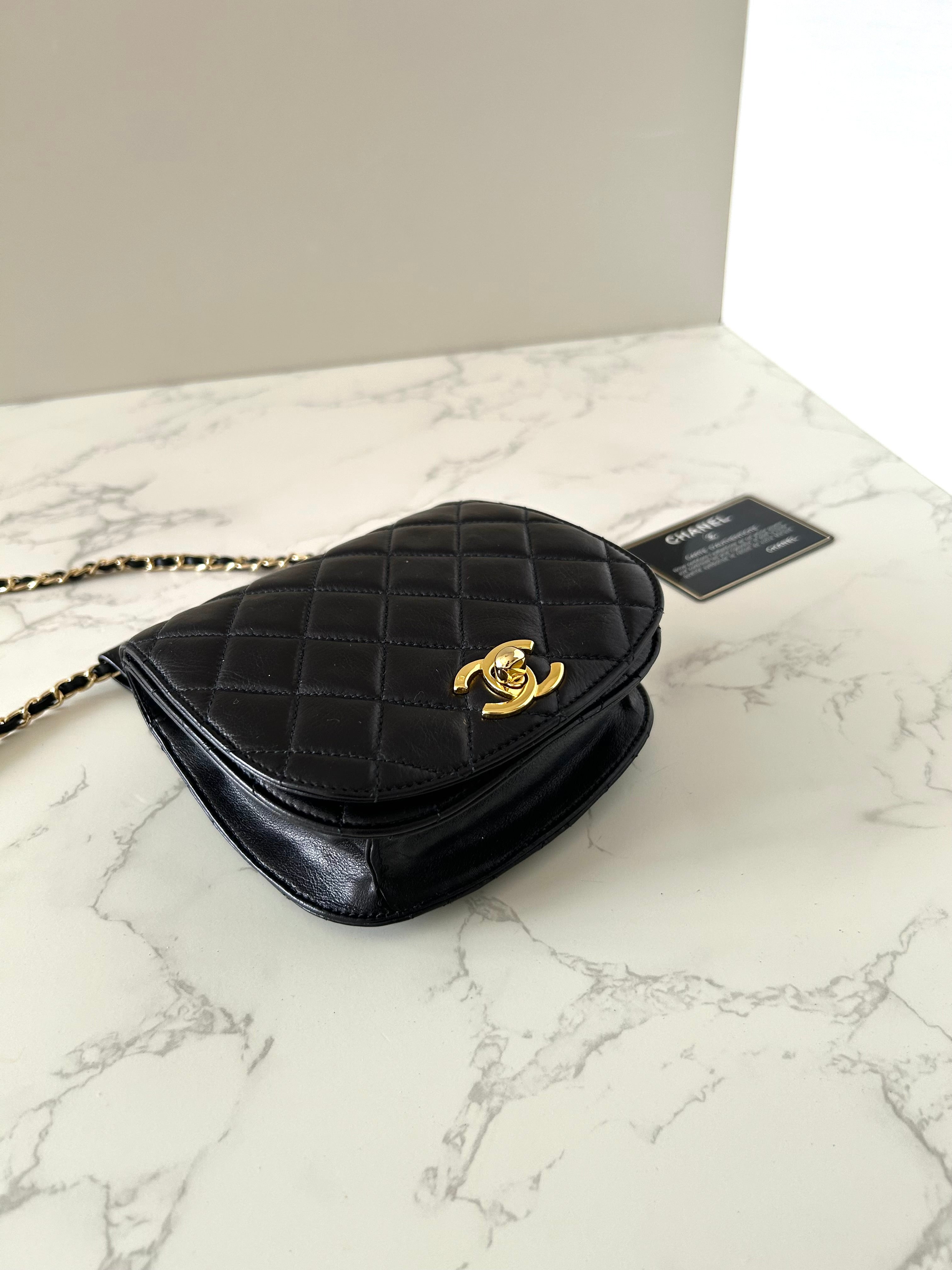 CHANEL rare black lambskin leather swivel buckle saddle bag / clutch / oblique bag