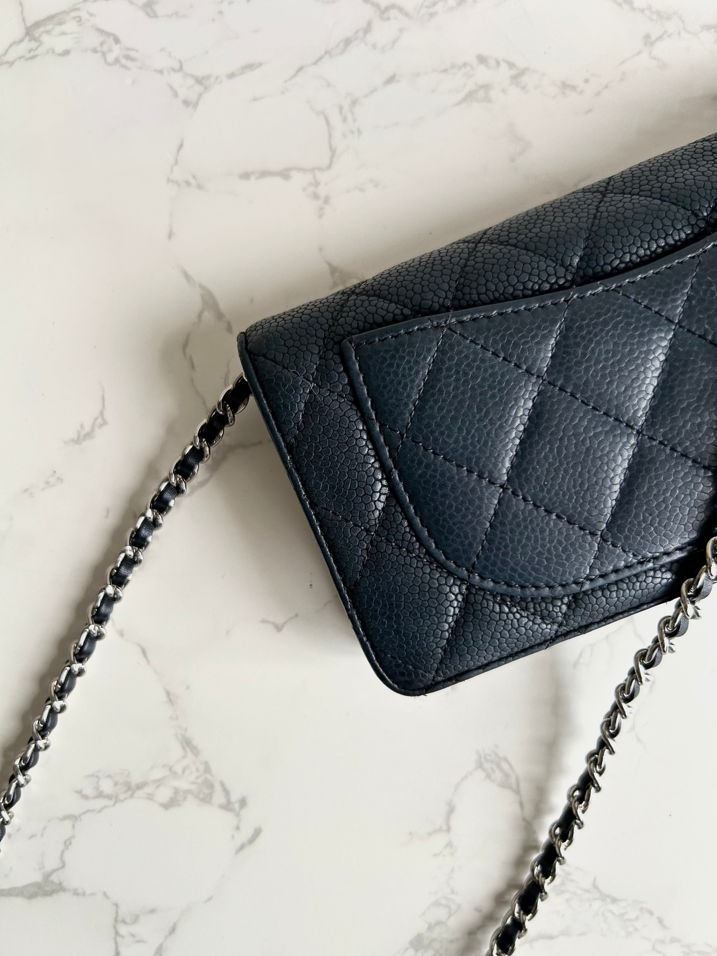 CHANEL black silver buckle caviar leather WOC long wallet / oblique bag / side bag