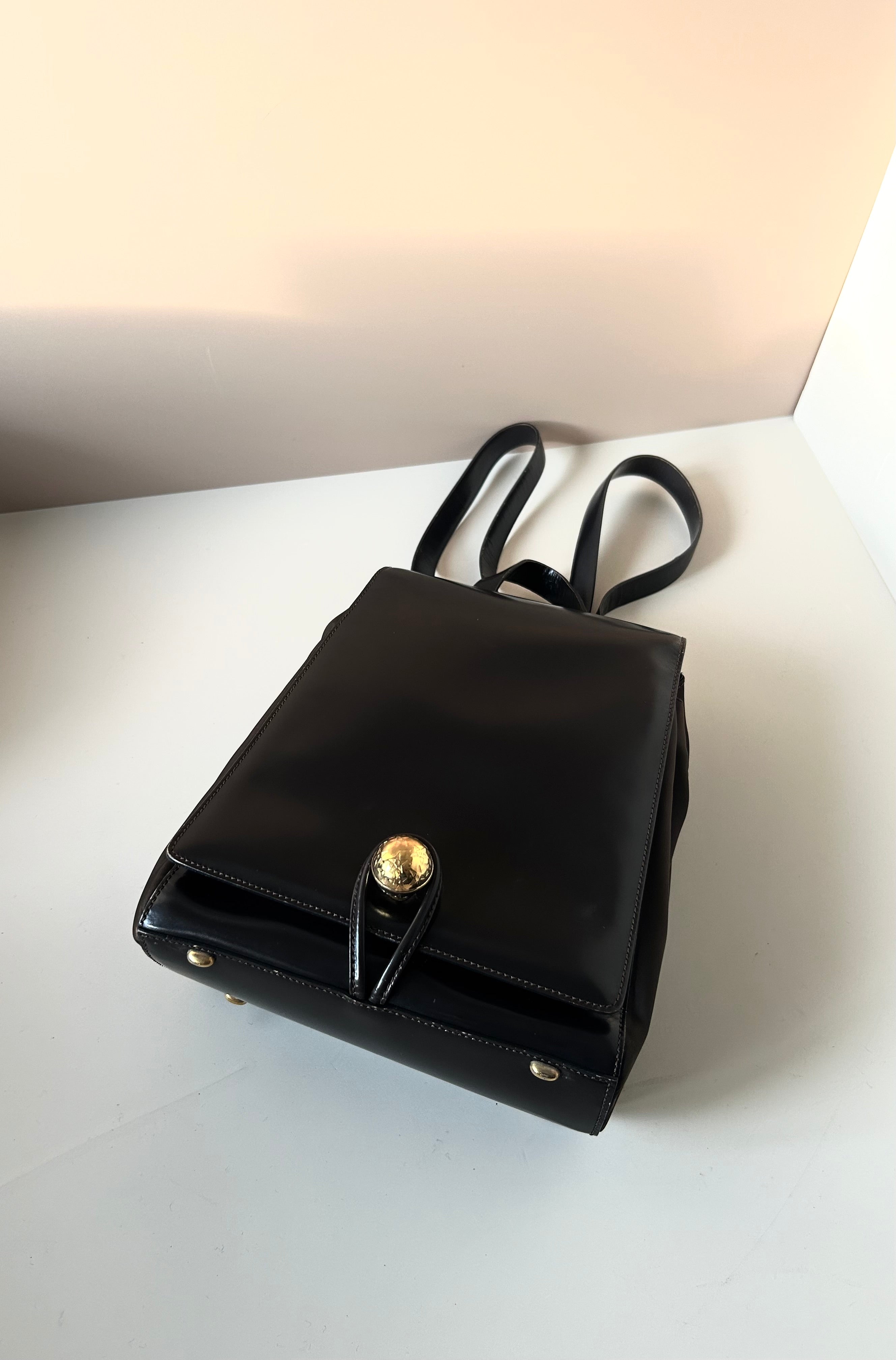 CELINE rare black and gold planet flap backpack / shoulder bag