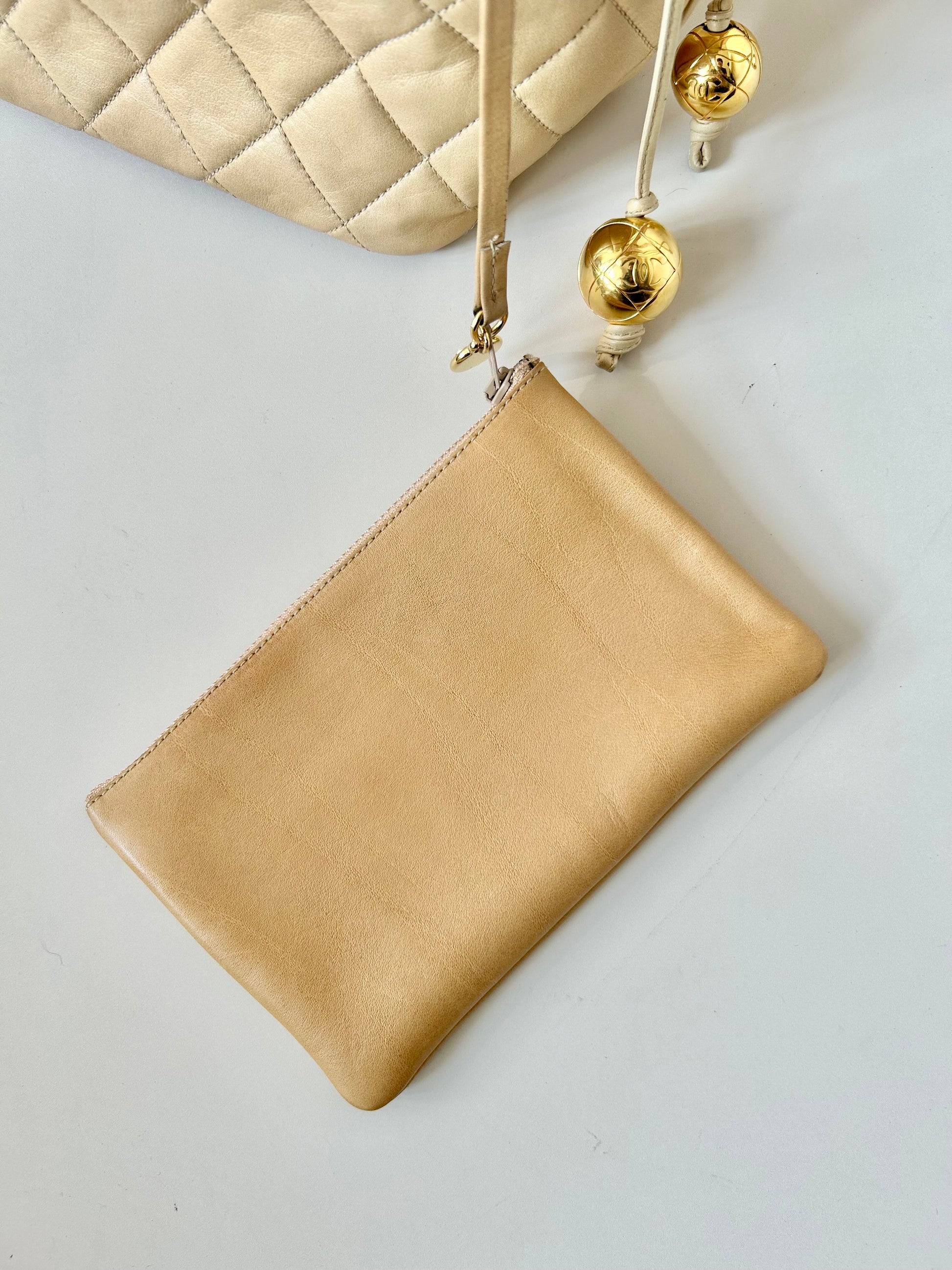 CHANEL rare beige lambskin double gold ball drawstring small bucket / side bag
