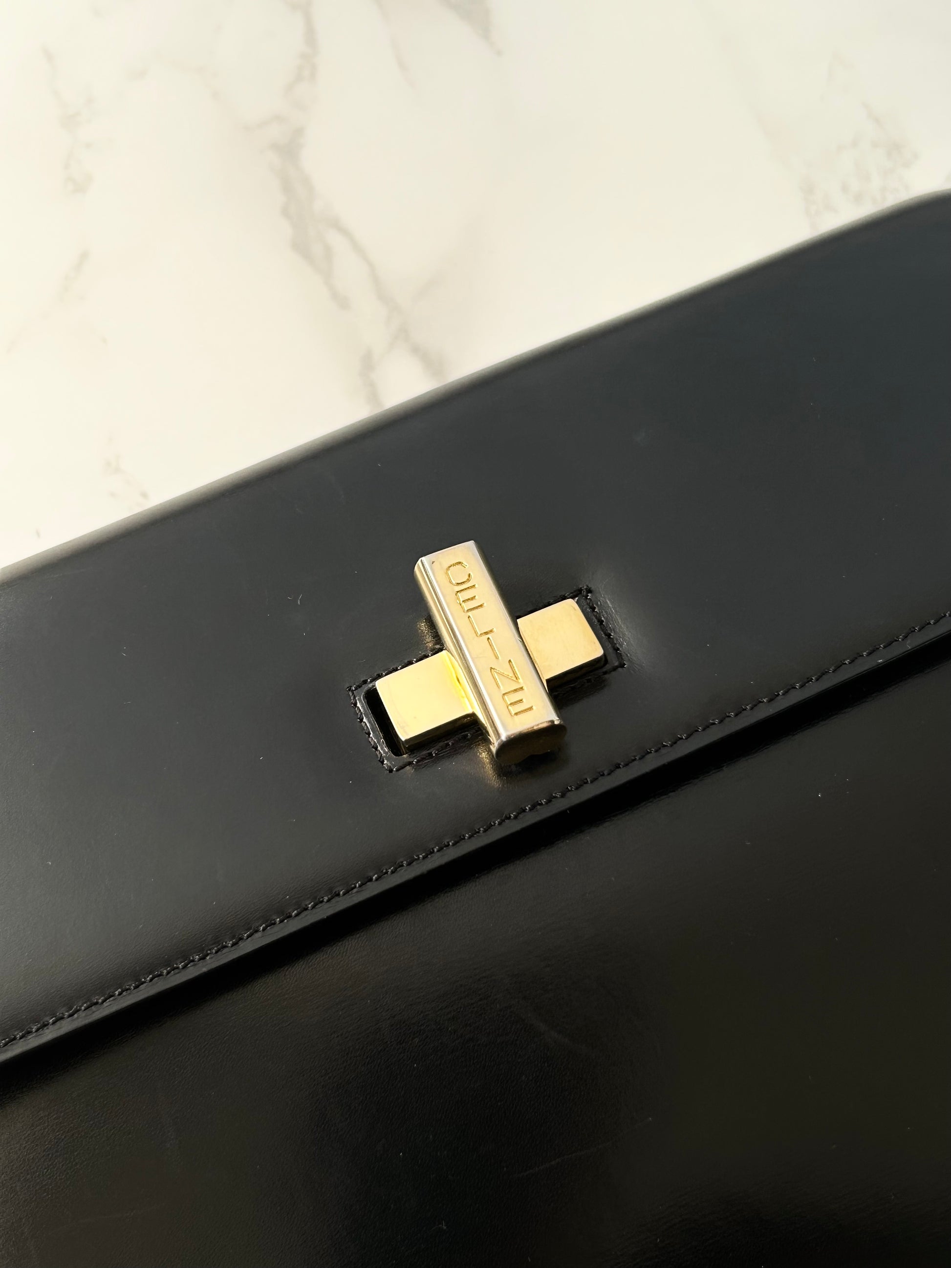 CELINE rare black cross rotating gold buckle leather small shoulder bag / crossbody bag