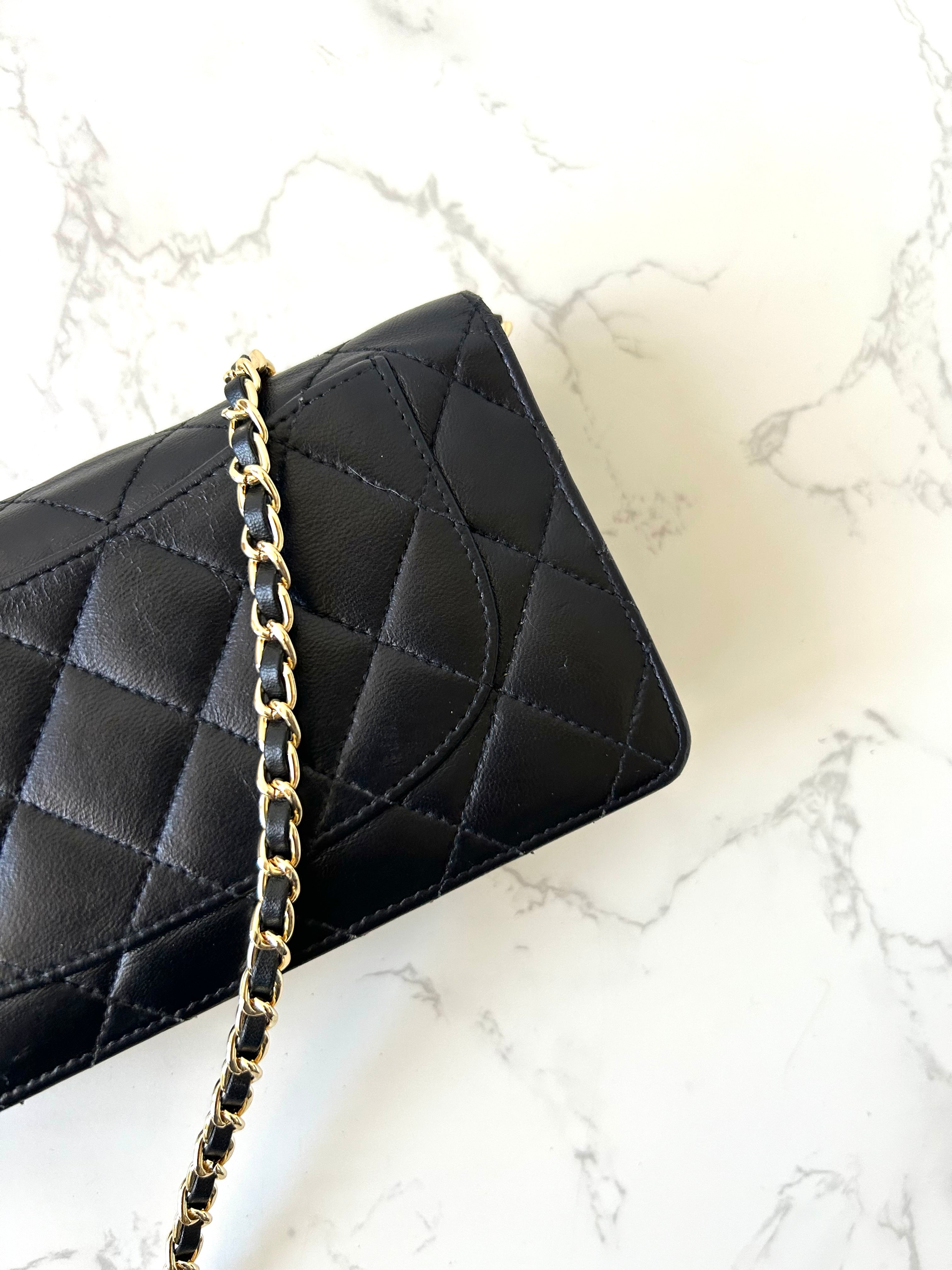CHANEL black gold lambskin leather WOC long wallet/oblique bag/side bag